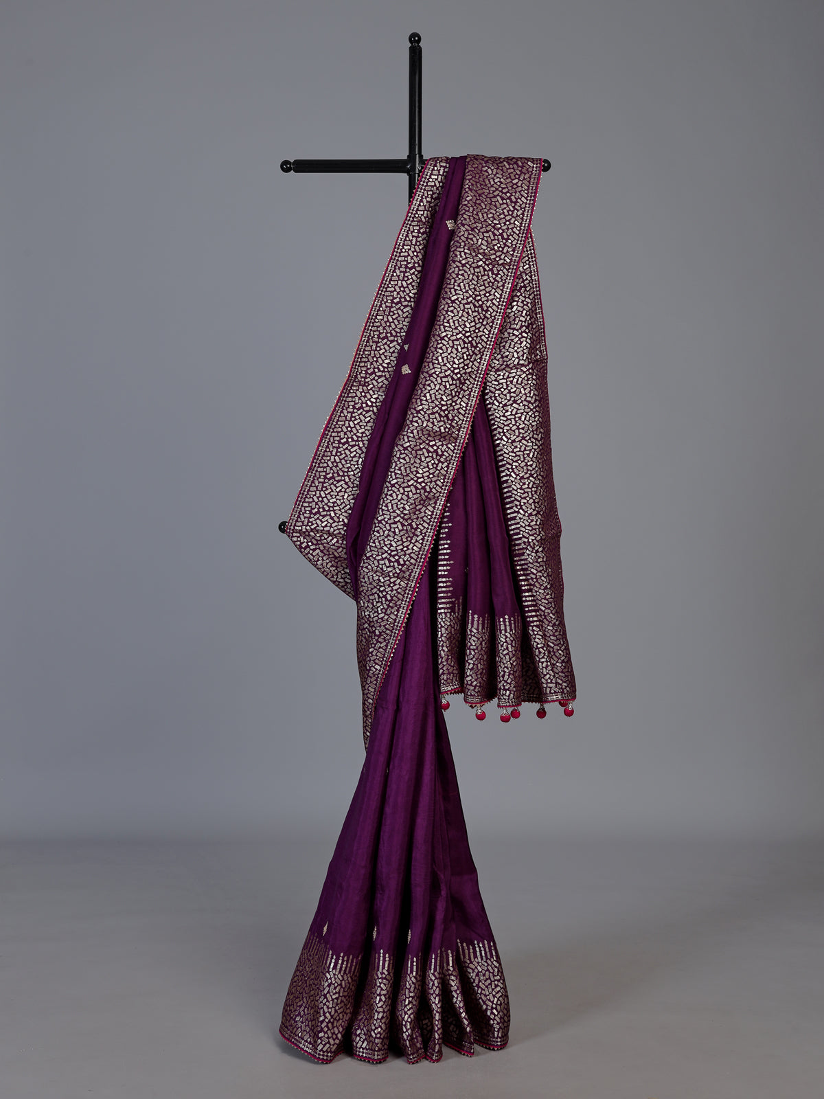 Purple dola silk saree with elegant butti pallu design