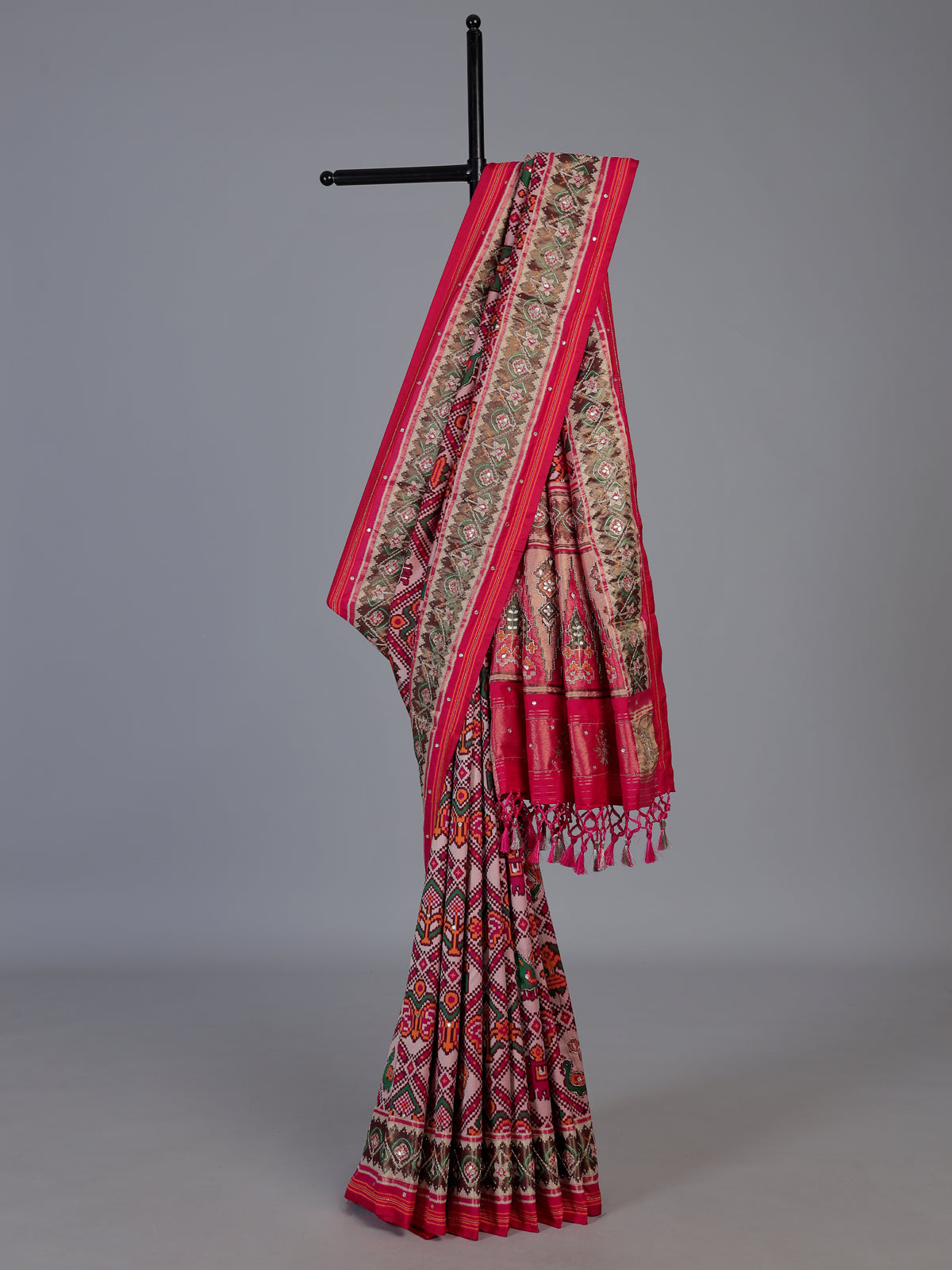 Rani pink art patola silk saree with traditional
