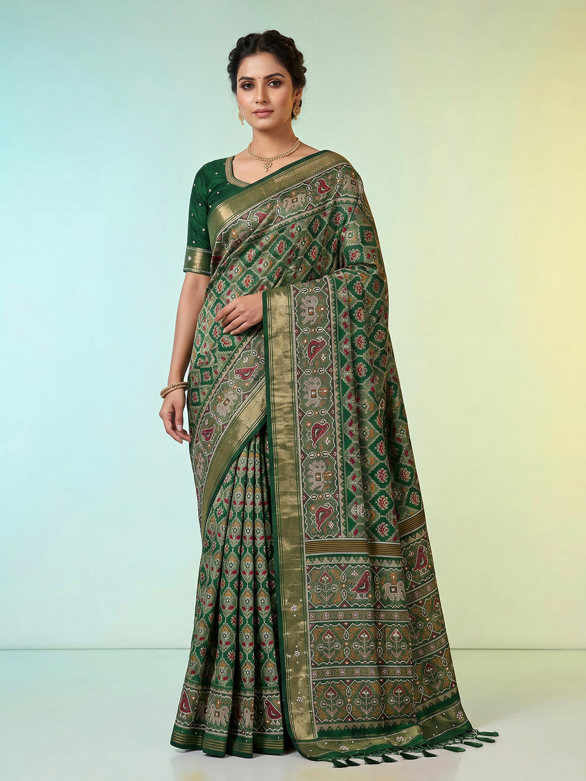 Green art patola silk saree with traditional motif handwork