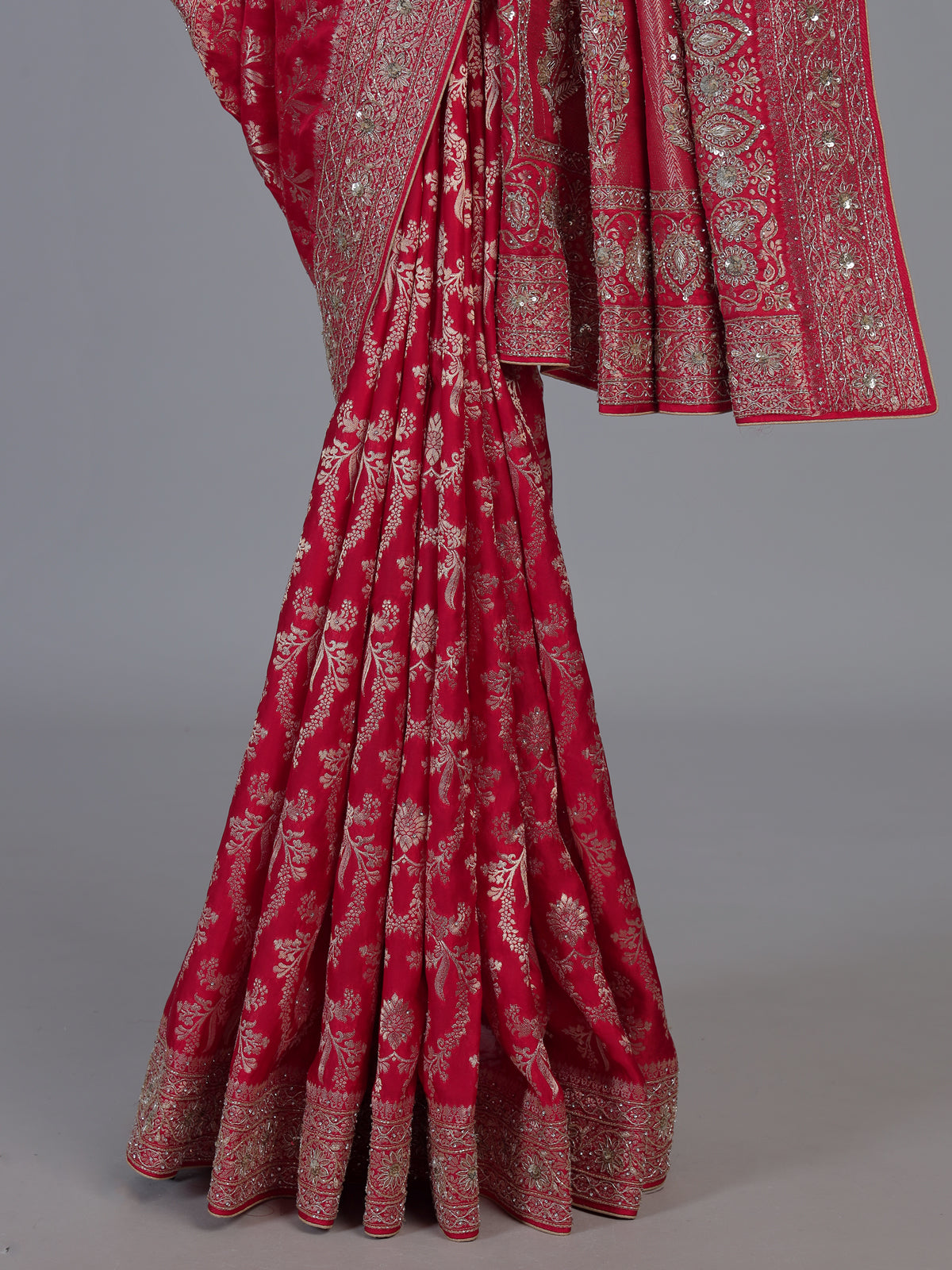 Red modal satin silk saree with bridal embellished elegance
