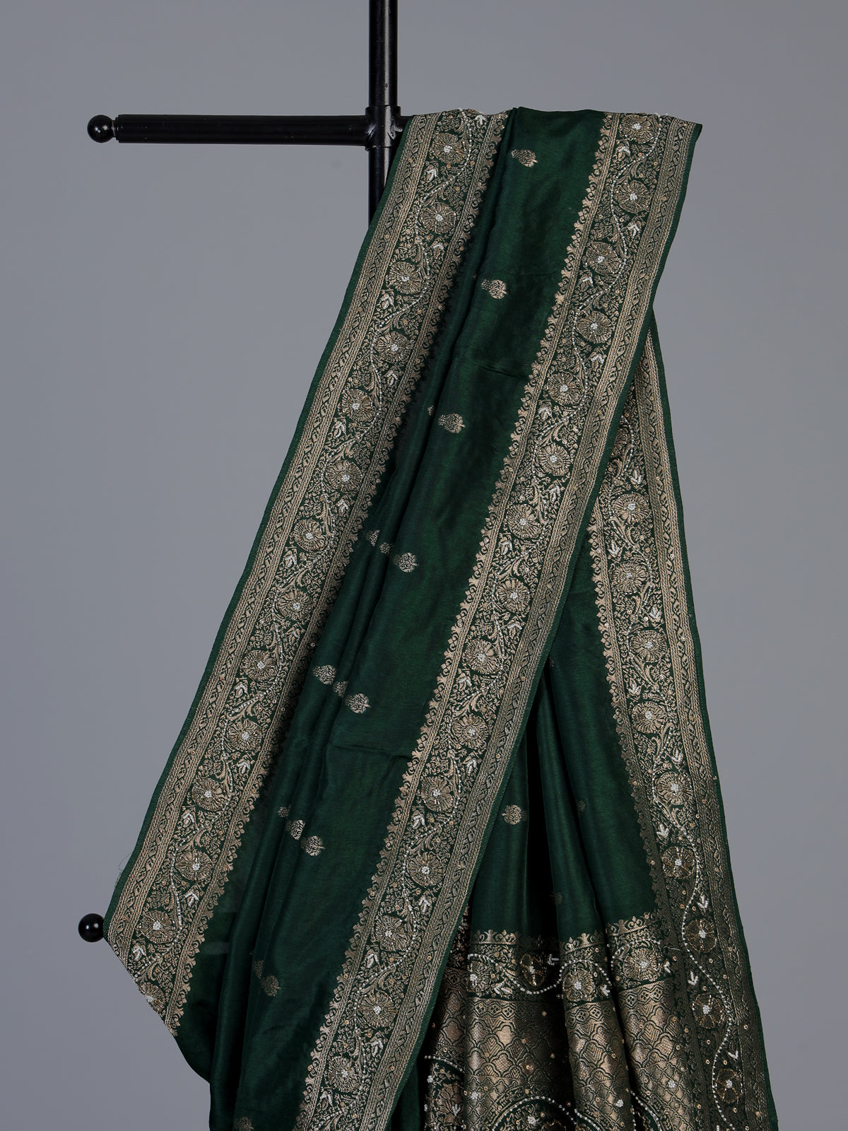 Green dola silk saree with rich butti elegance