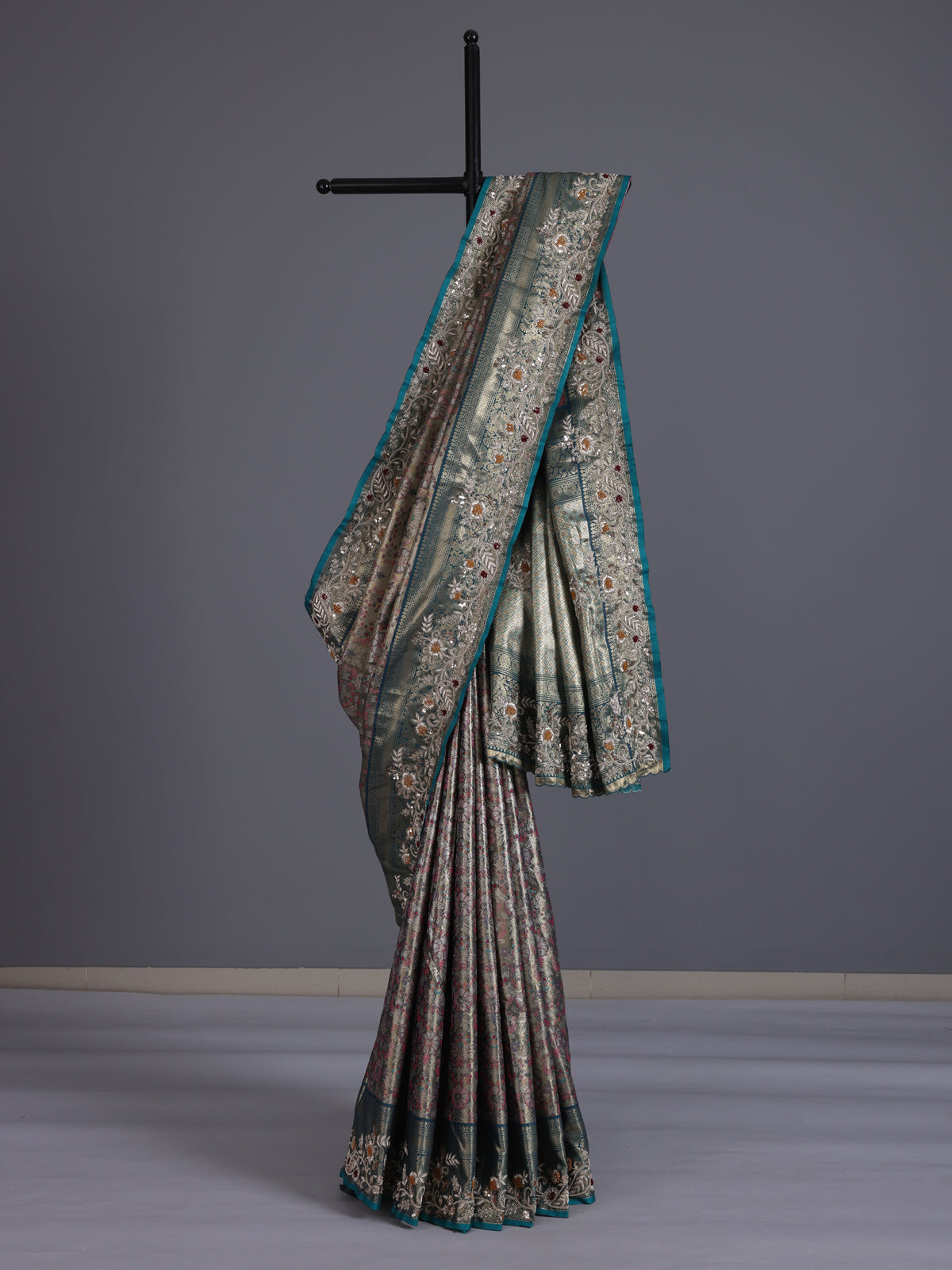 Rama green kanjivaram tissue silk saree with floral zari elegance