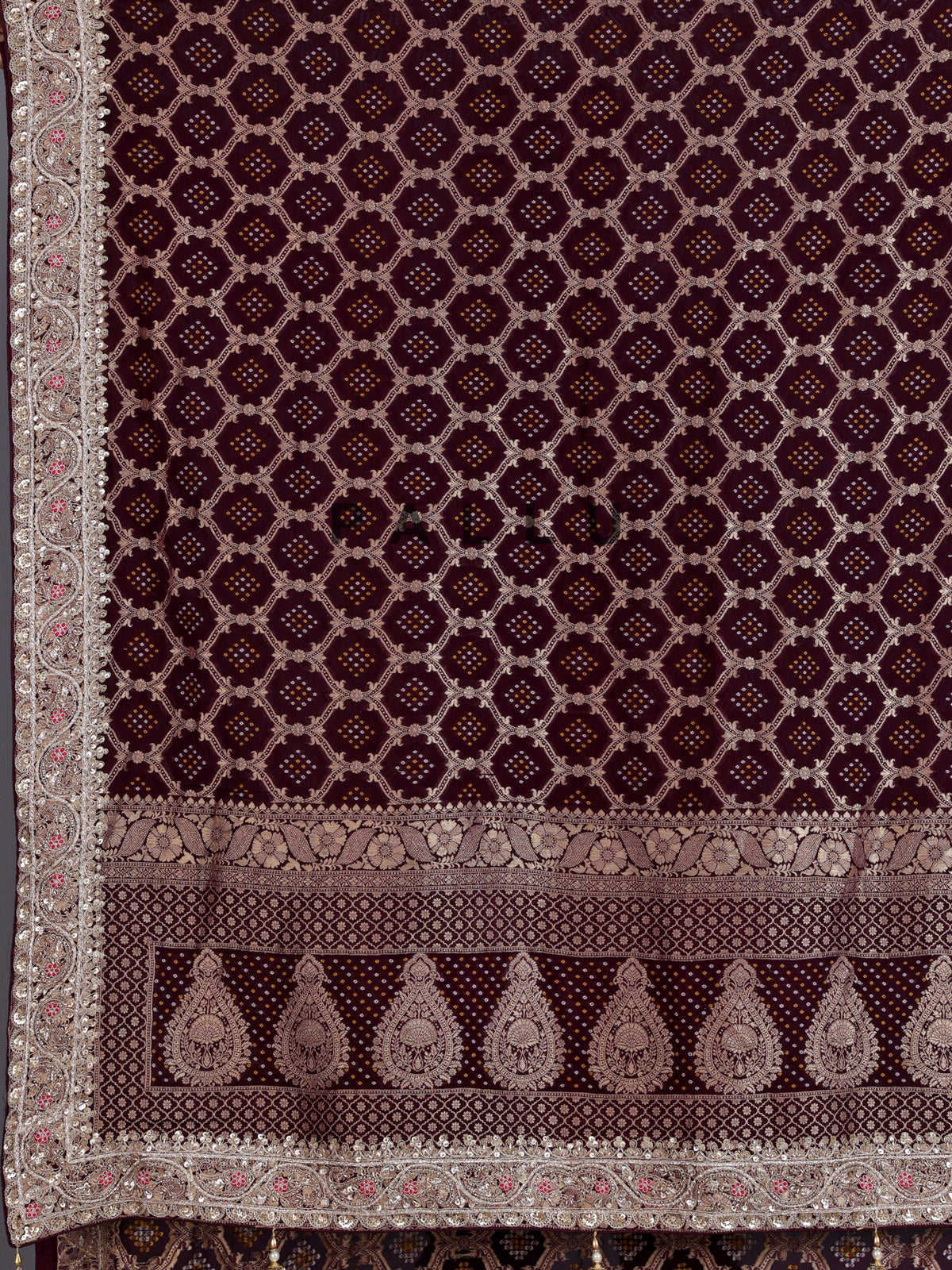 Wine bandhani semi georgette saree with elegant tassel pallu detailing