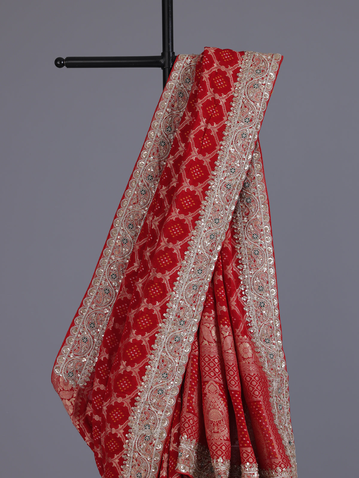 Red bandhani semi georgette saree with designer tassel pallu elegance