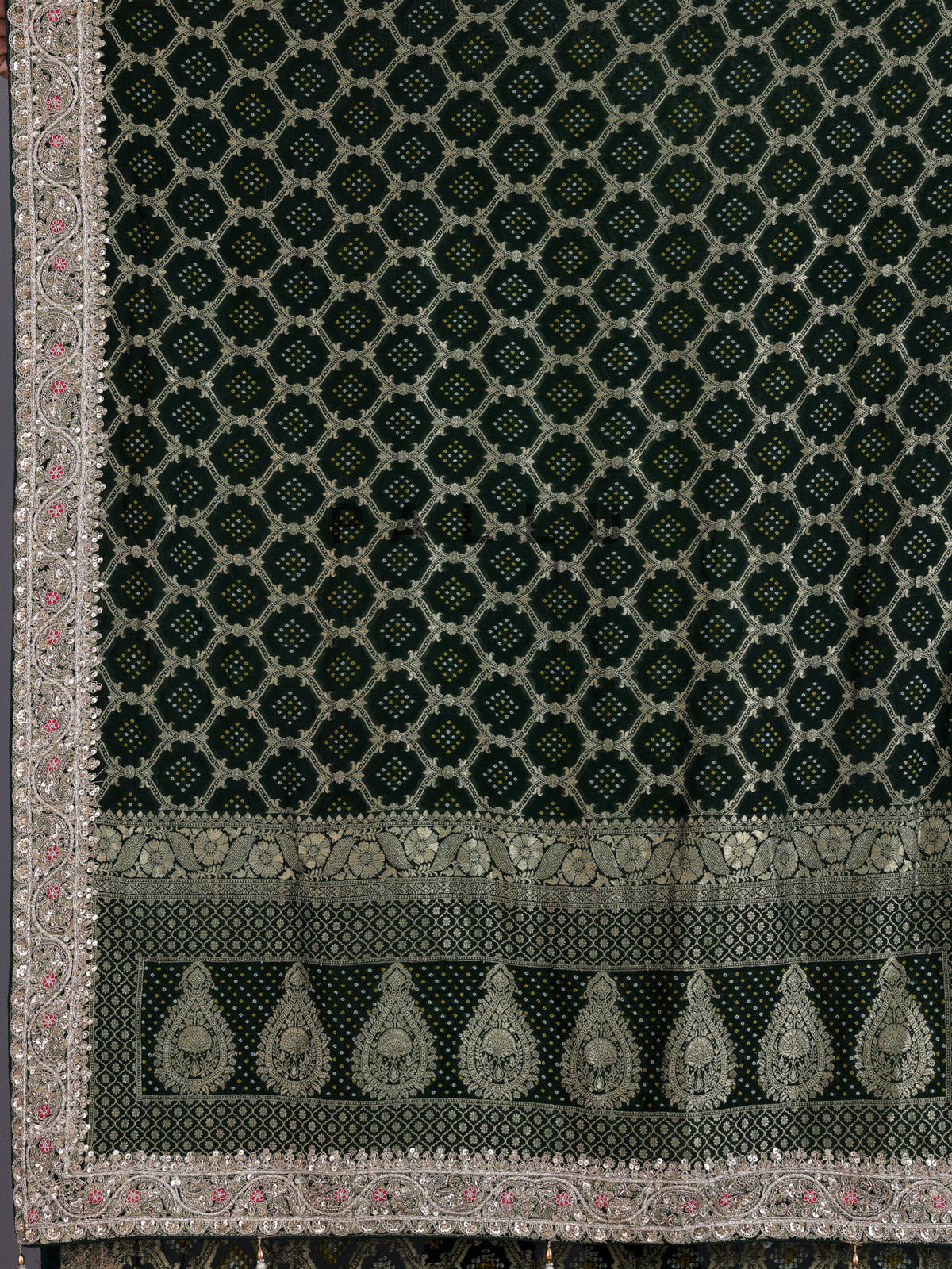Green bandhani semi georgette saree with tassel pallu elegance
