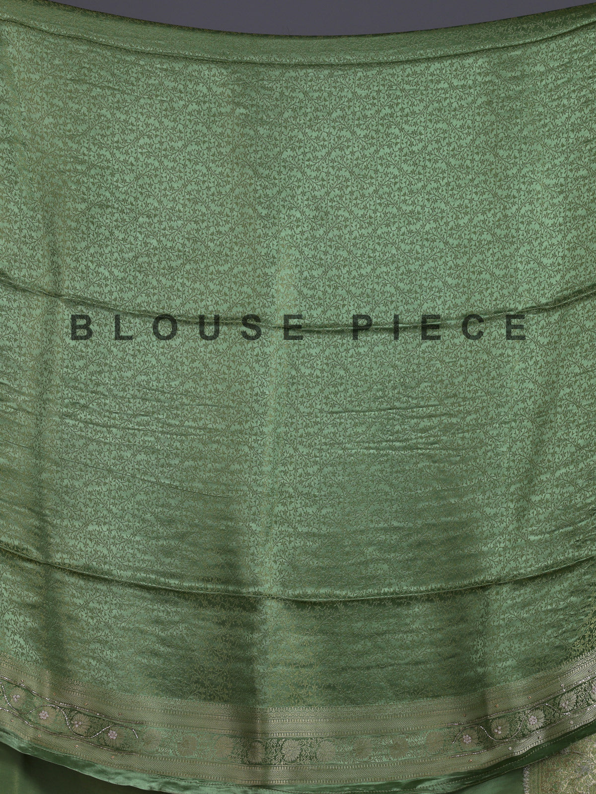 Pastel pista green shimmer dola silk saree with peacock motifs