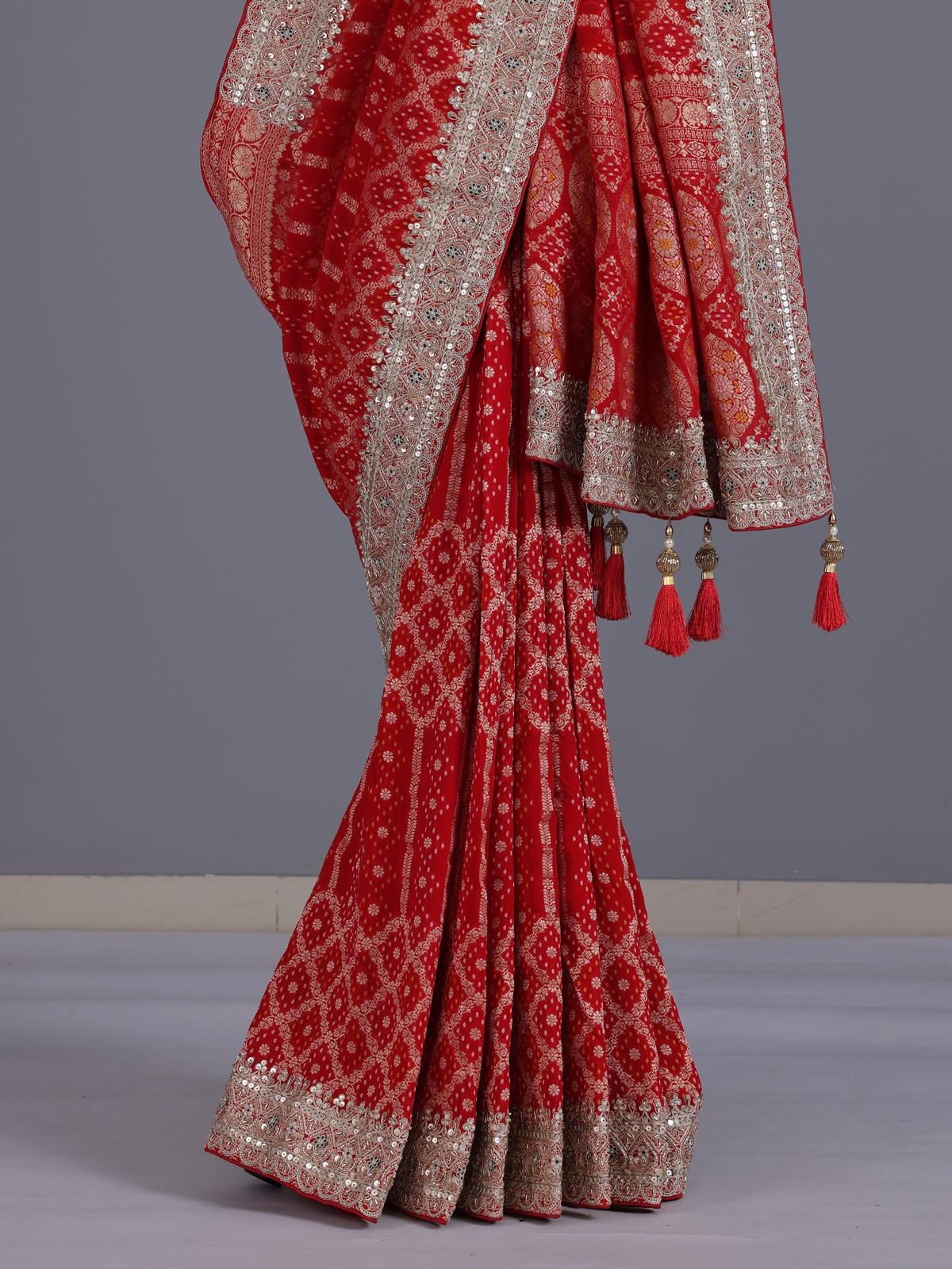 Red bandhani semi georgette saree with designer pallu