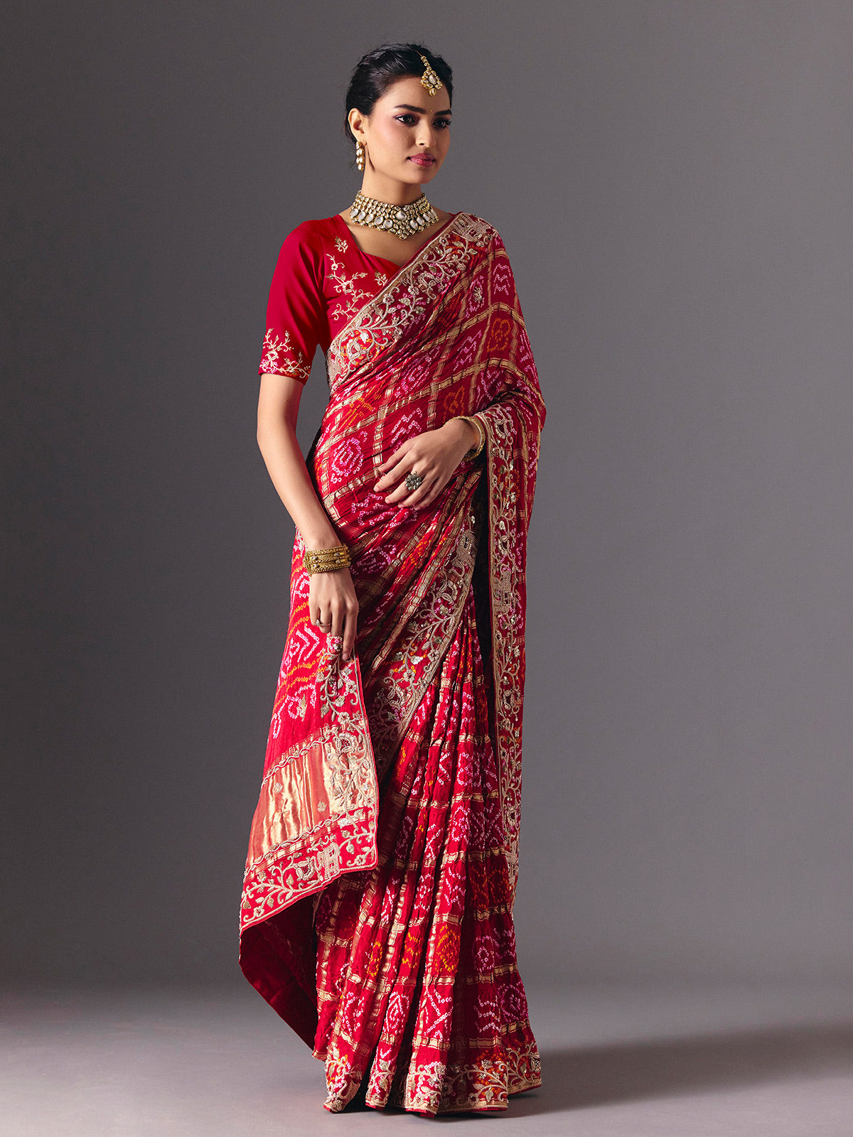 Red traditional bandhani silk bridal saree with elegance