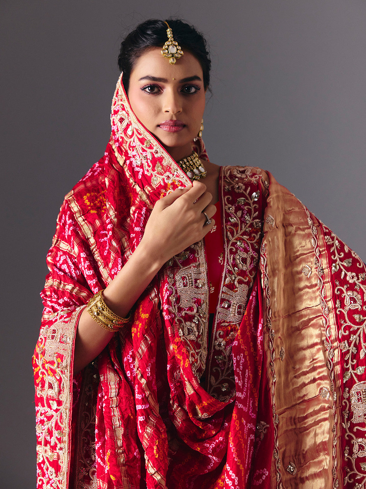Red traditional bandhani silk bridal saree with elegance