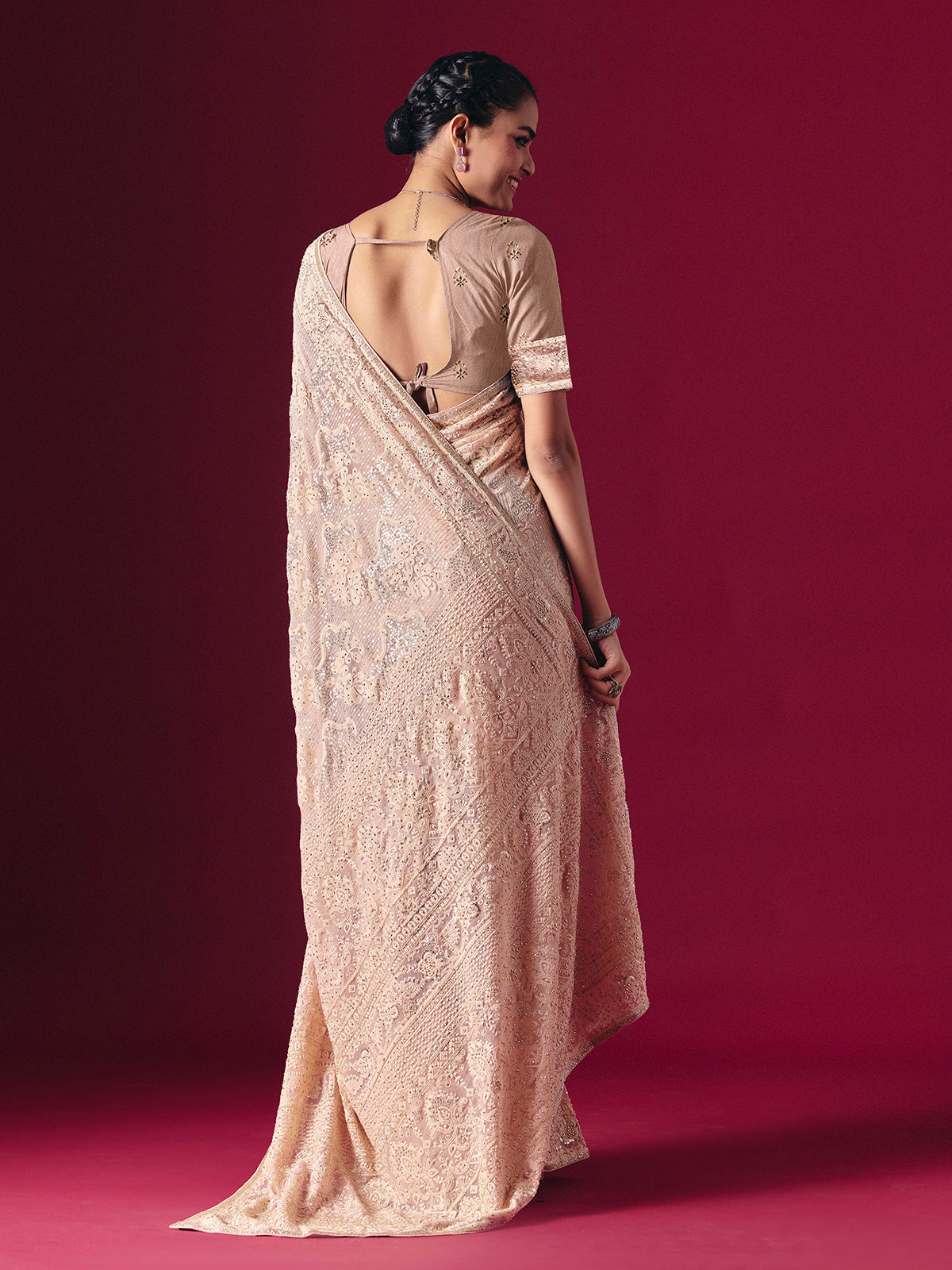 Light peach Lucknowi georgette saree with chikankari designer detailing