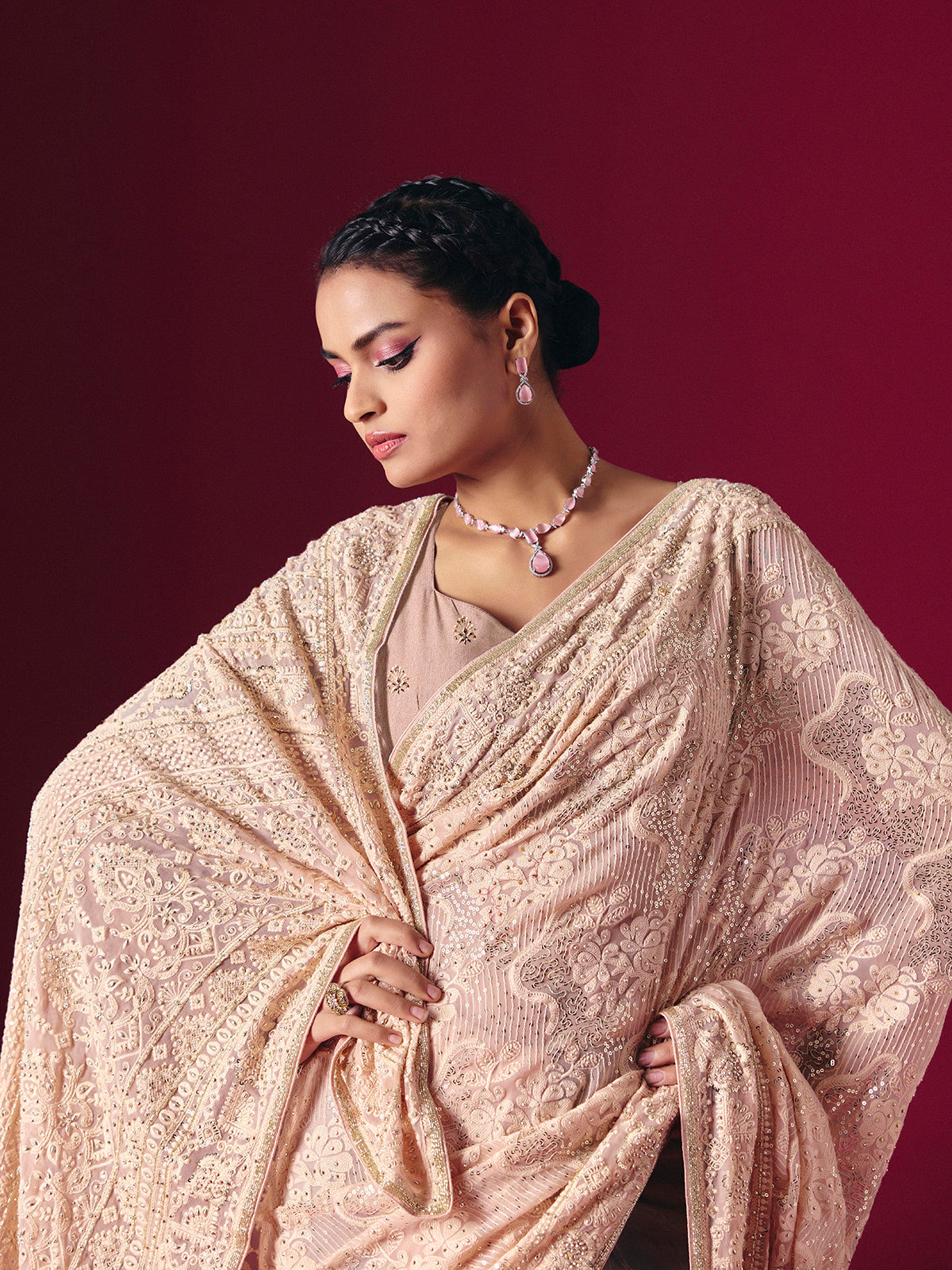 Light peach Lucknowi georgette saree with chikankari designer detailing