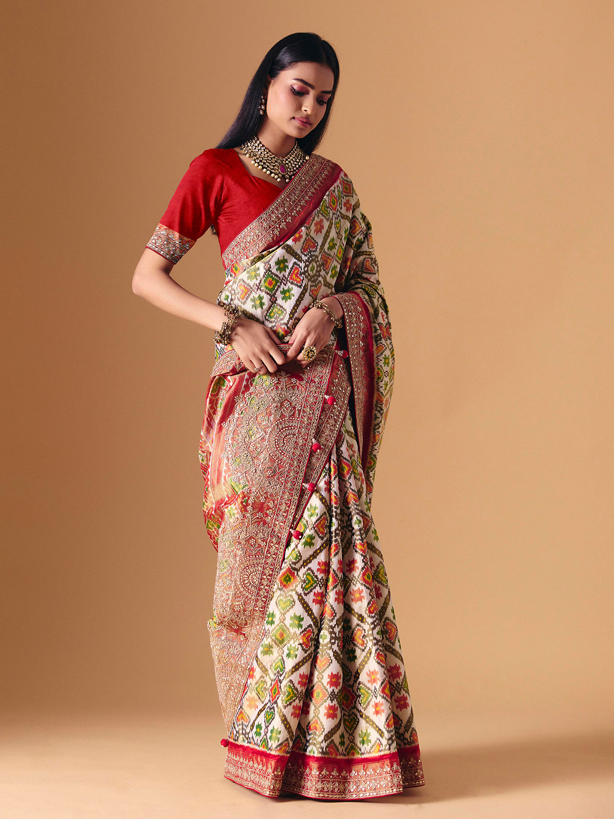 Off white Hyderabadi patola silk saree with gota pati elegance