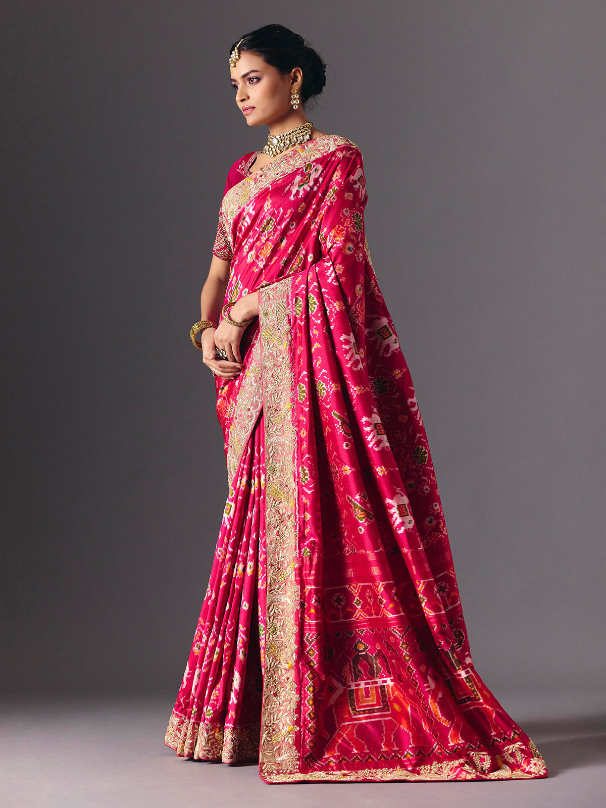 Rani pink Hyderabadi patola silk saree with designer zari embellishments
