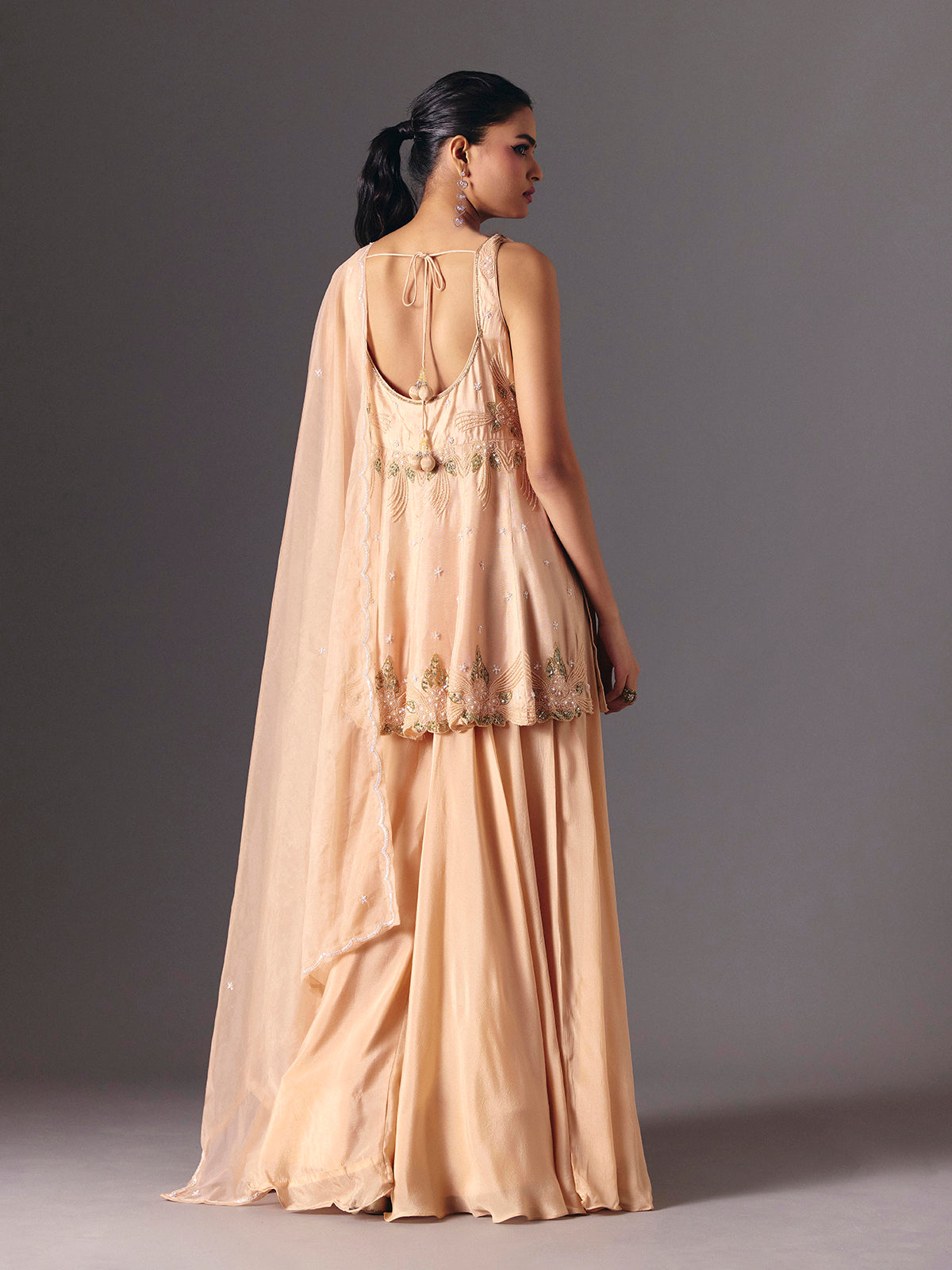 Peach silk palazzo salwar suit for wedding celebration