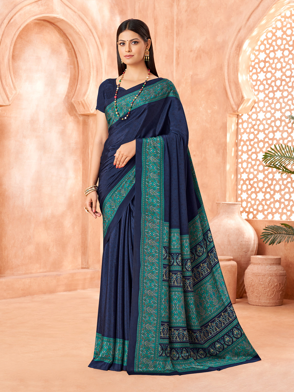 Navy blue printed contrast border and pallu crepe silk saree