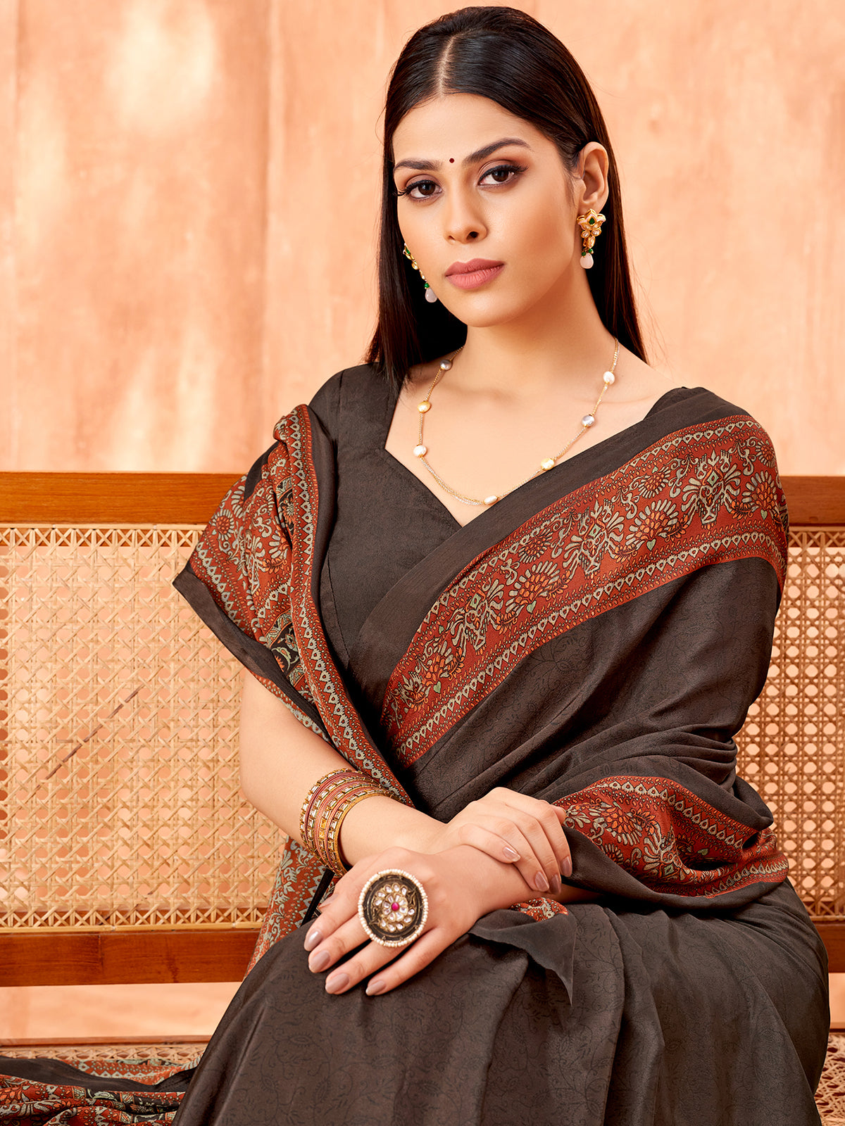 Charcoal grey contrast border crepe silk saree in printed