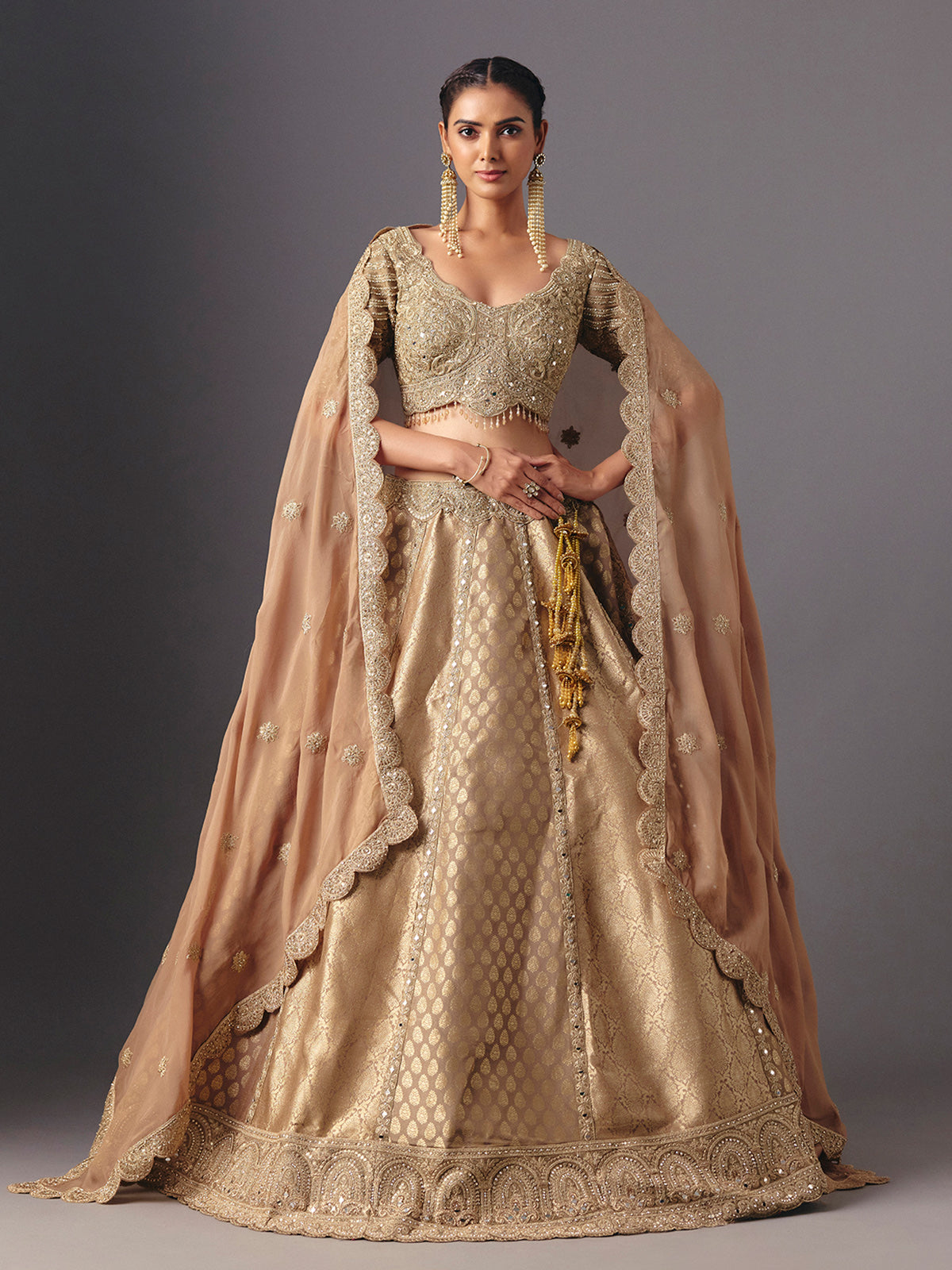 Beige brocade designer lehenga choli with dupatta for celebrations
