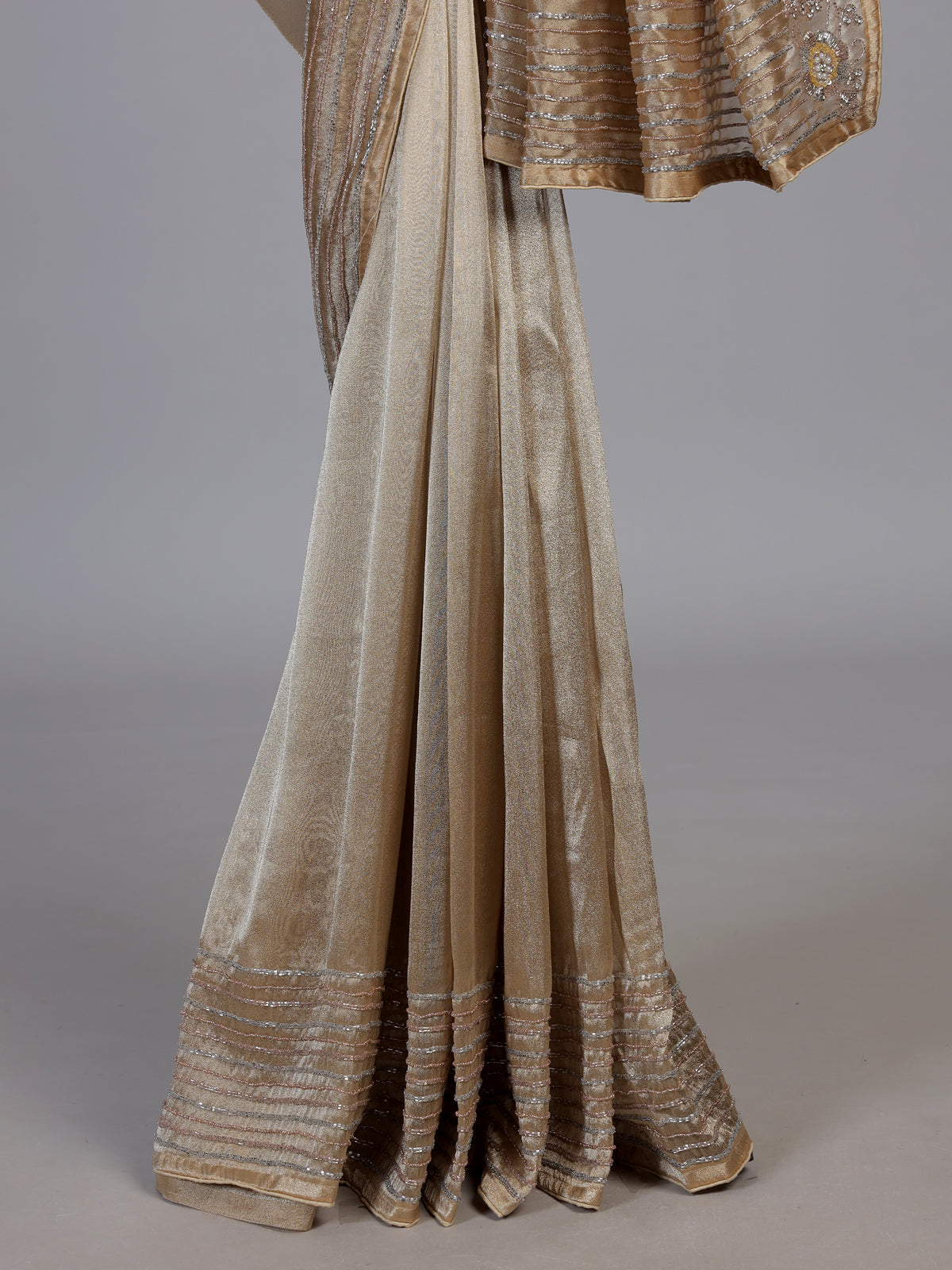Beige metallic pleated tissue silk saree women