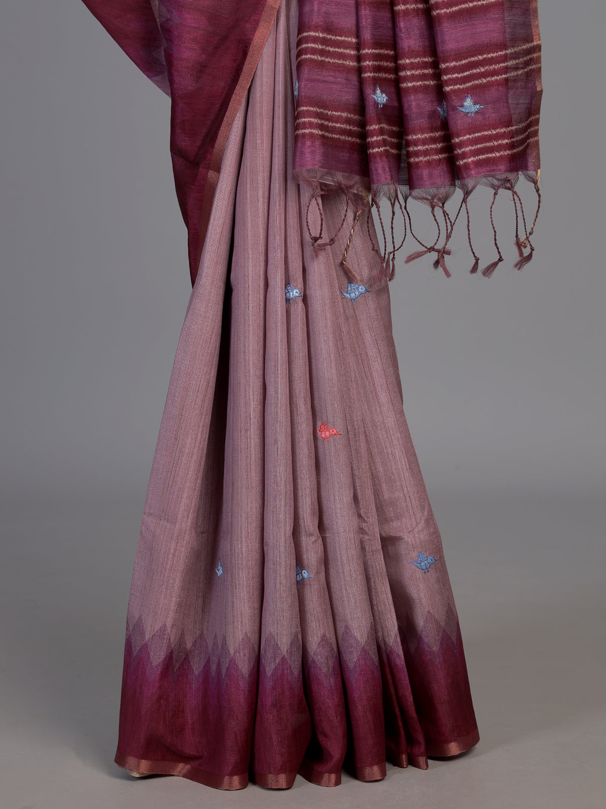 Wine cotton silk saree with bird motifs and tassel accents