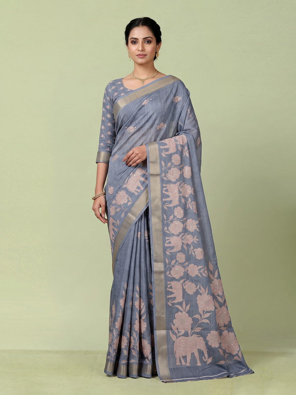 Stone blue art silk saree with floral and elephant motif detailing