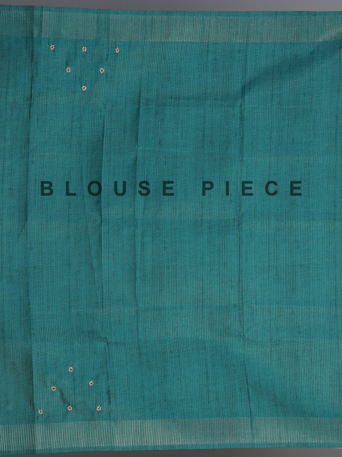 Beige tusser silk saree with regal zari border detailing