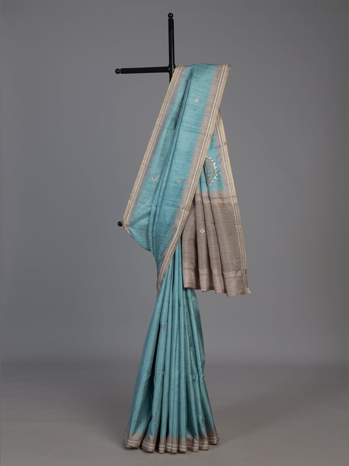 Sky blue semi tusser silk saree with rich zari embellishments