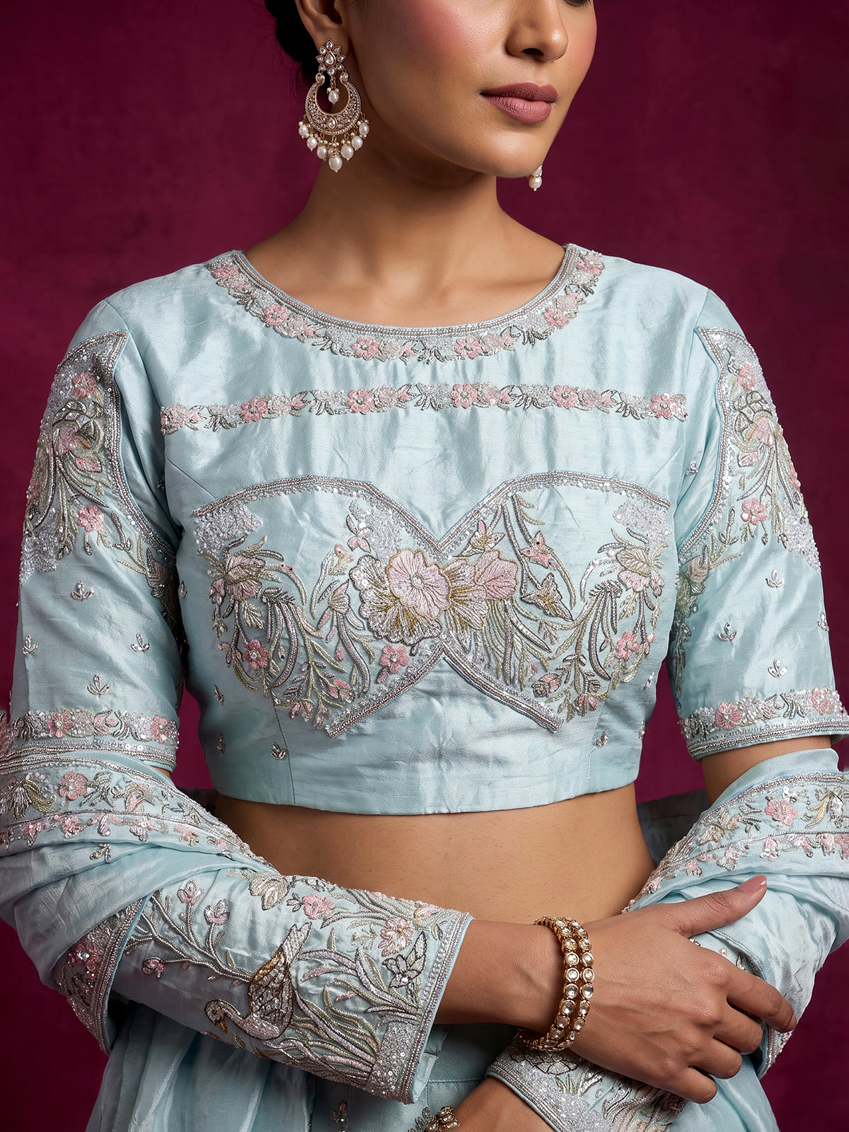 Mint blue tissue silk lehenga choli with enchanting motifs