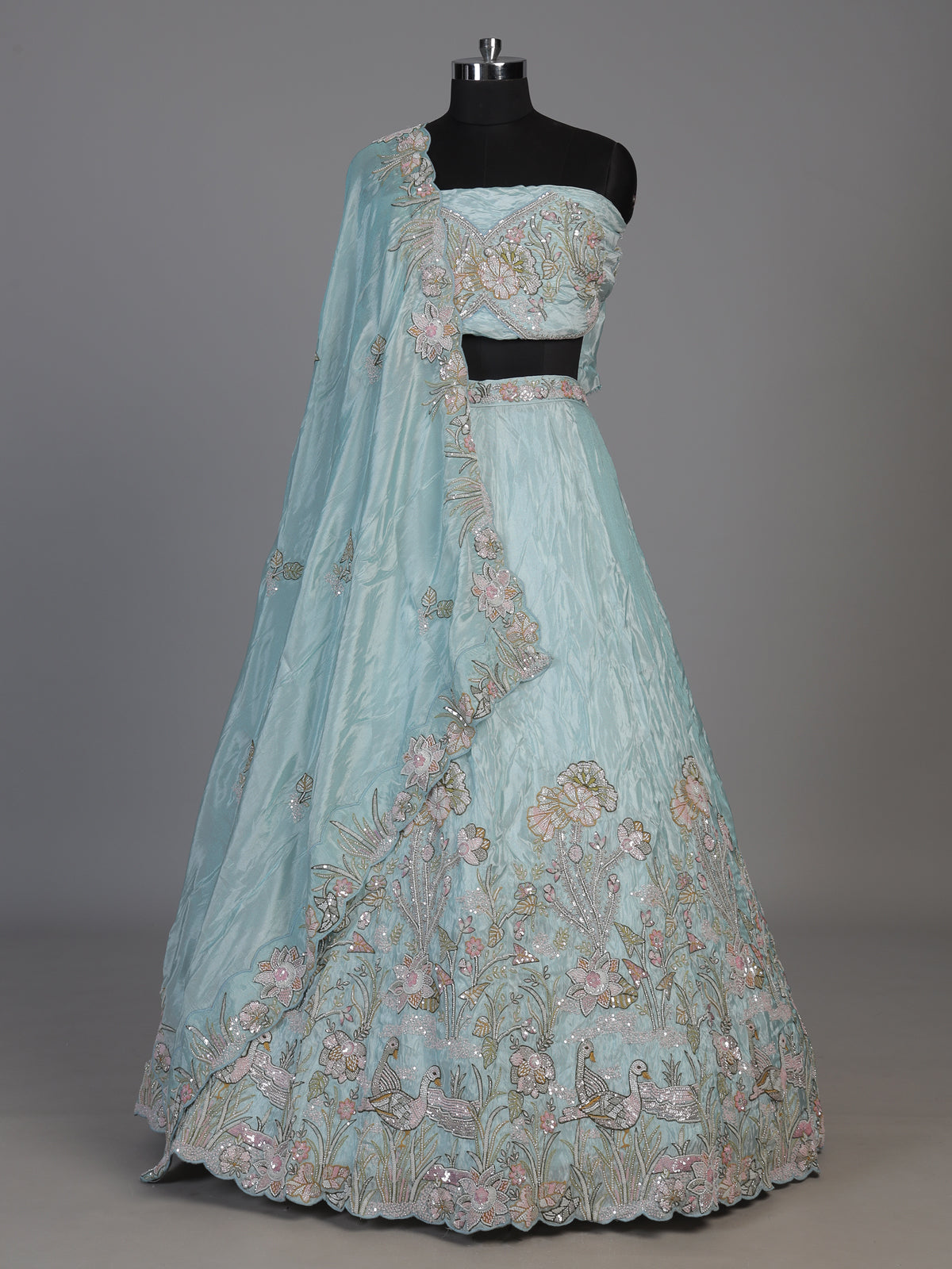 Mint blue tissue silk lehenga choli with enchanting motifs