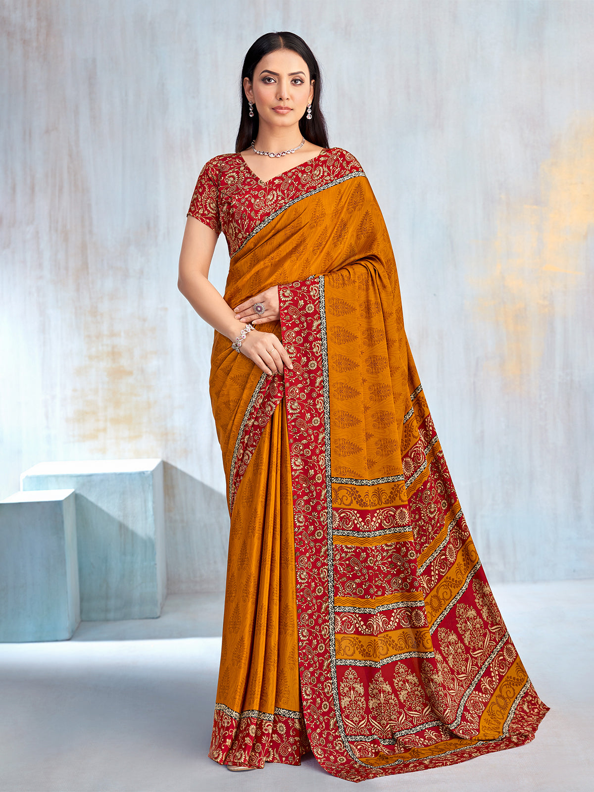 Mustard yellow floral printed contrast border and pallu saree