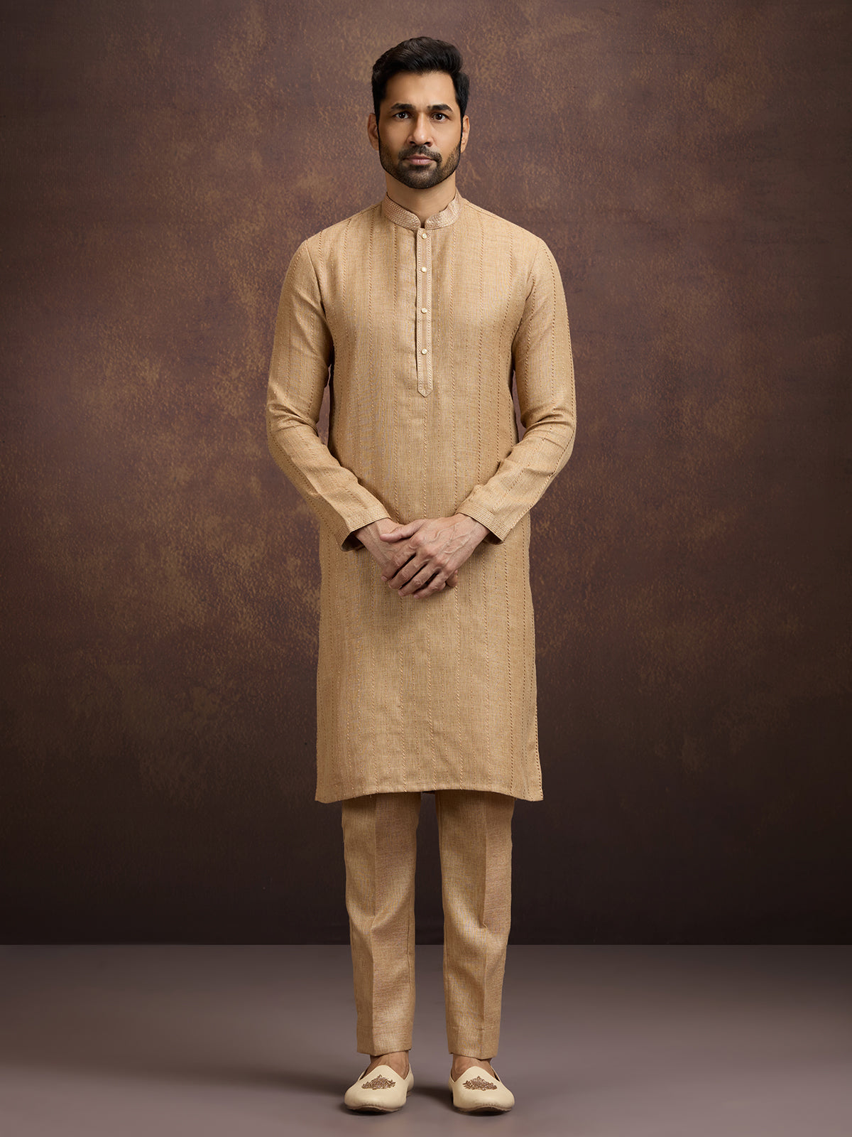 Gold graceful embroidered linen kurta pajama attire