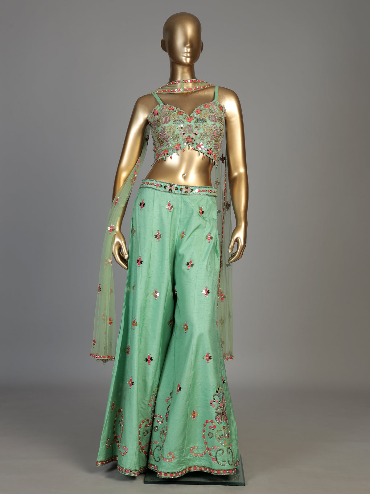 Pista green women jharokha embellished sharara suit