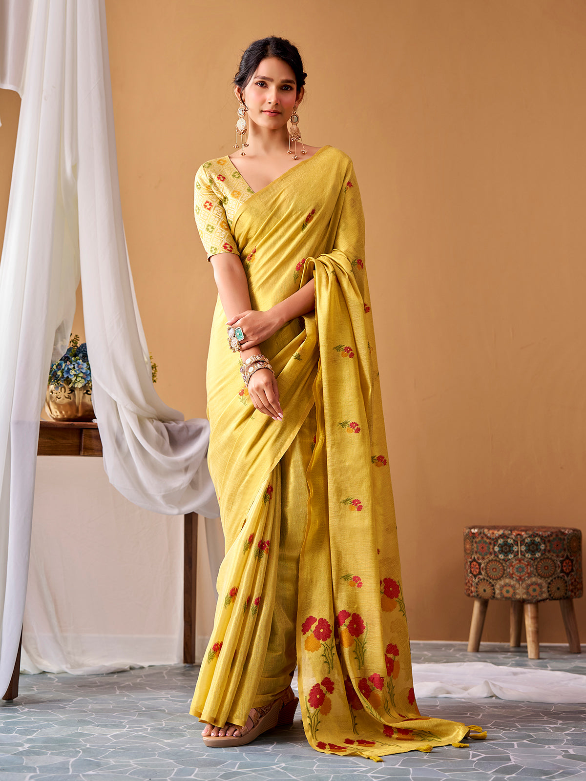 Light yellow graceful tissue silk saree