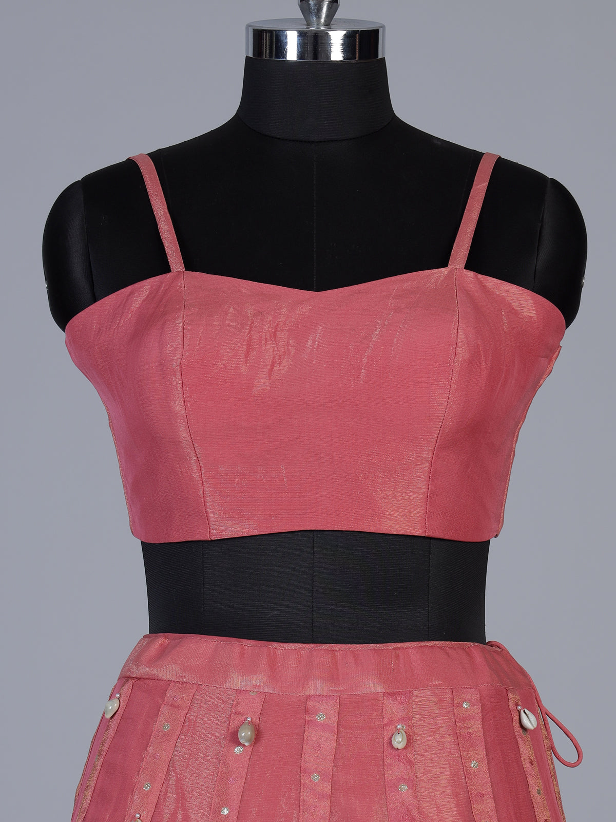 Pink tissue silk lehenga choli with exquisite traditional embellishments