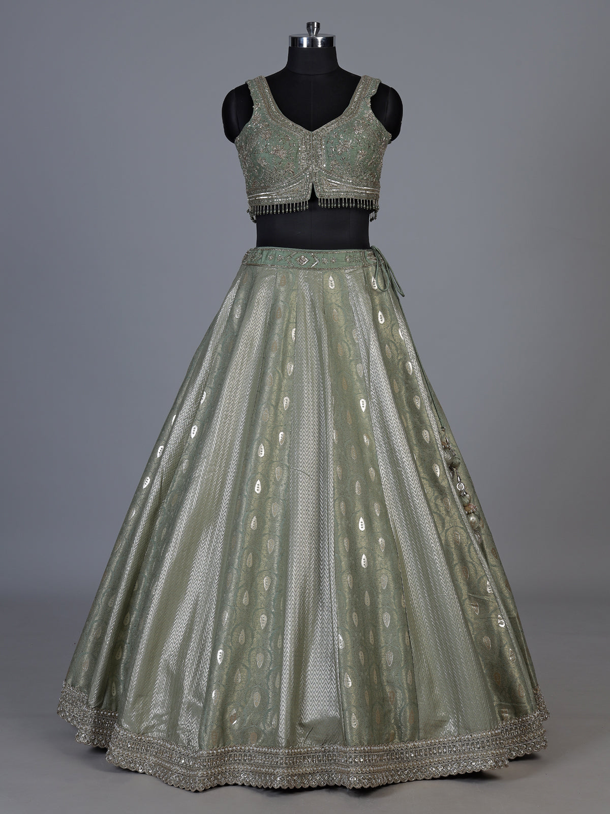Pista green jacquard brocade lehenga choli with ornate detailing
