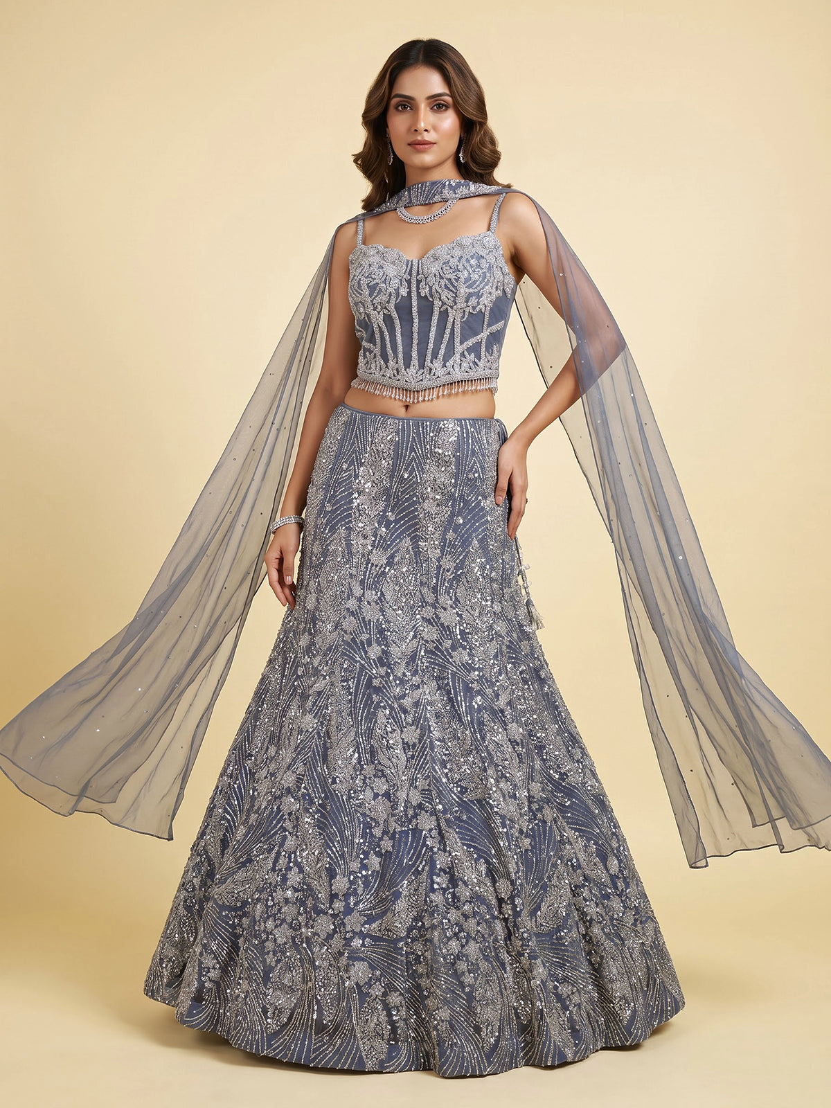 Stone grey net lehenga choli with zardosi stone embellishments
