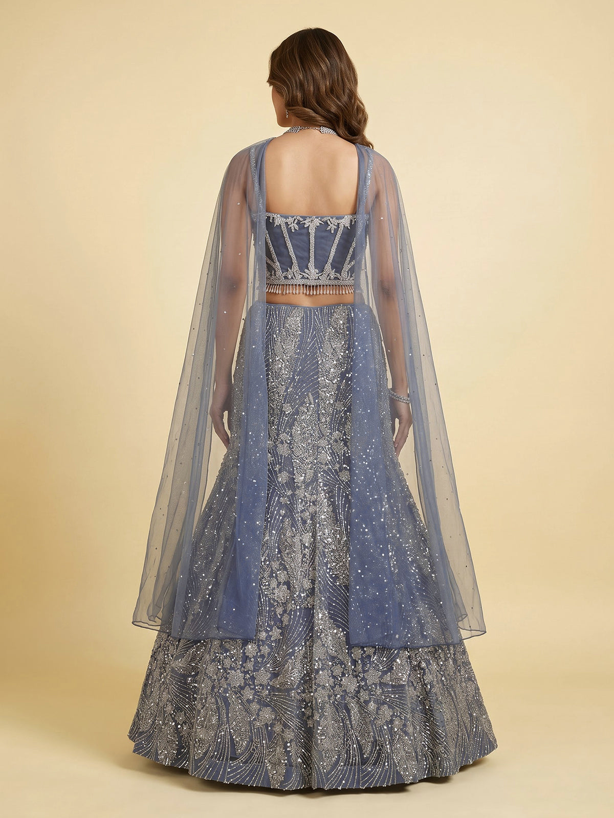 Stone grey net lehenga choli with zardosi stone embellishments