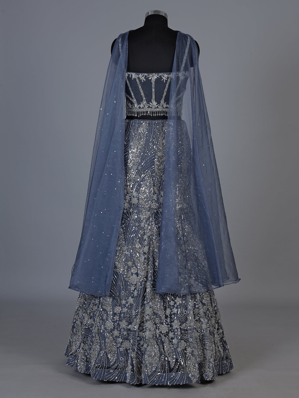 Stone grey net lehenga choli with zardosi stone embellishments