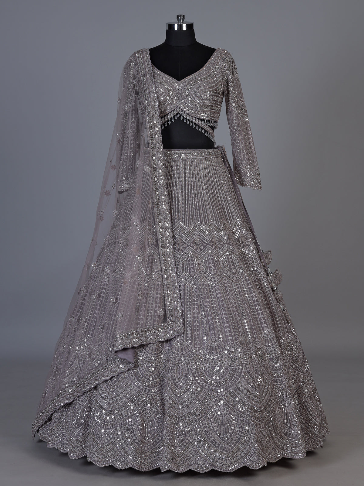 Lavender purple net lehenga choli with sparkling diamond tassel detailing
