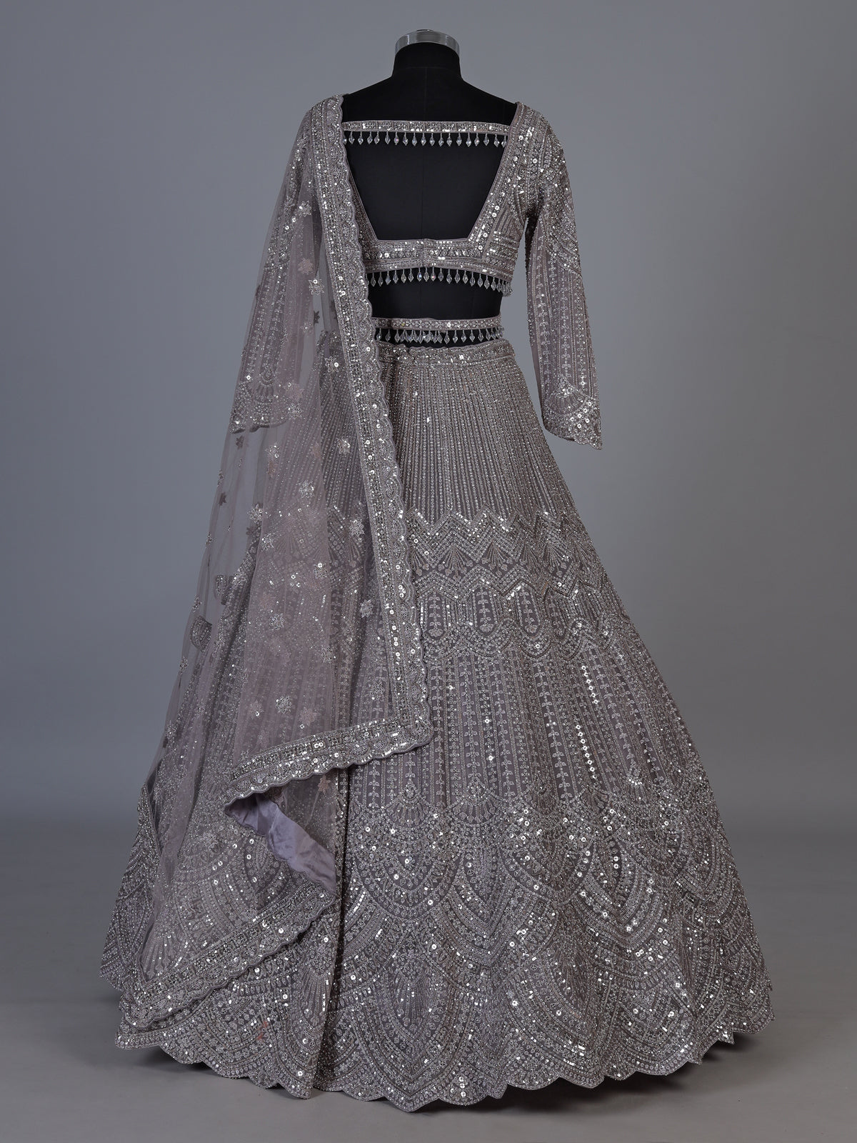 Lavender purple net lehenga choli with sparkling diamond tassel detailing