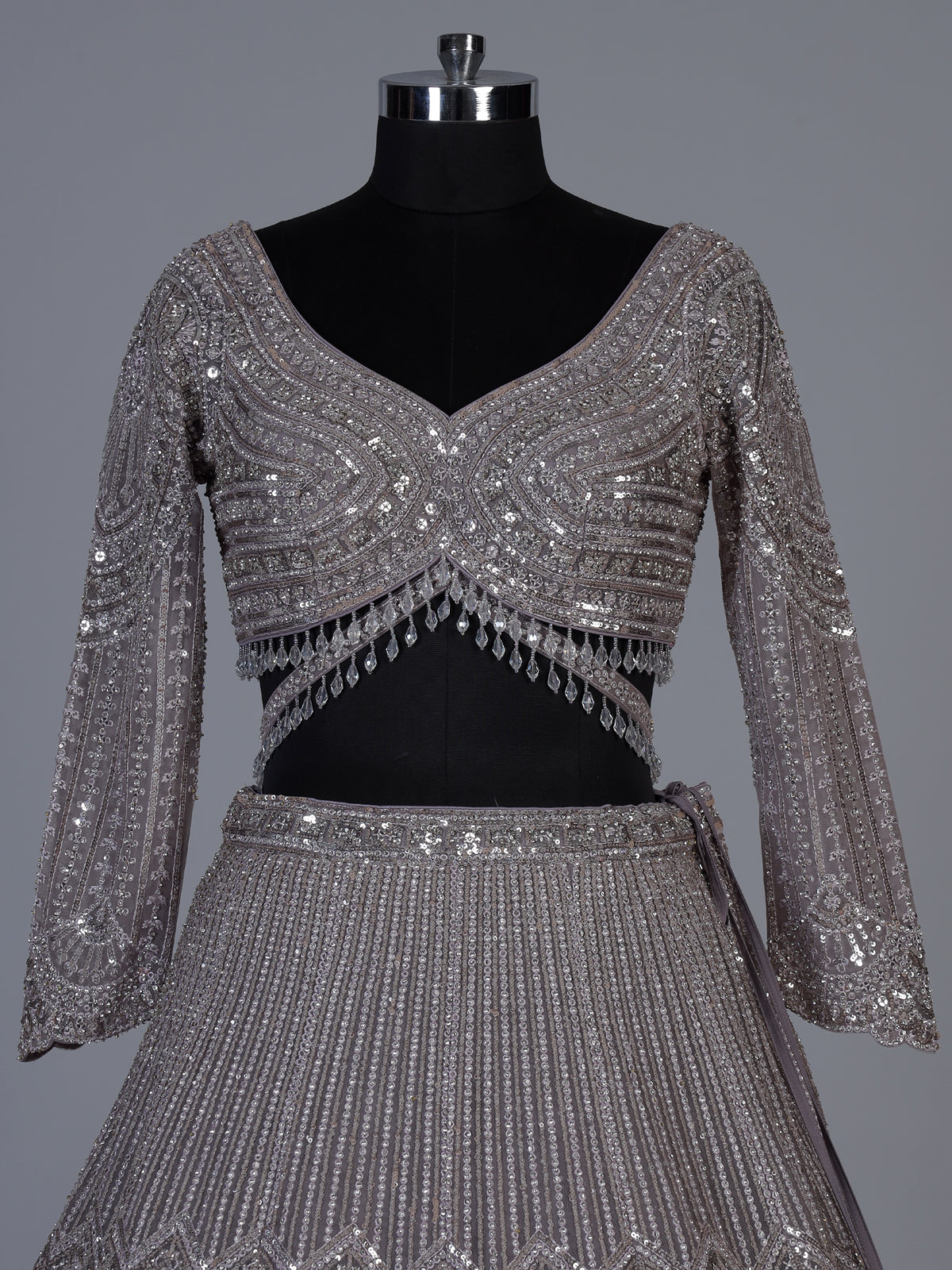 Lavender purple net lehenga choli with sparkling diamond tassel detailing