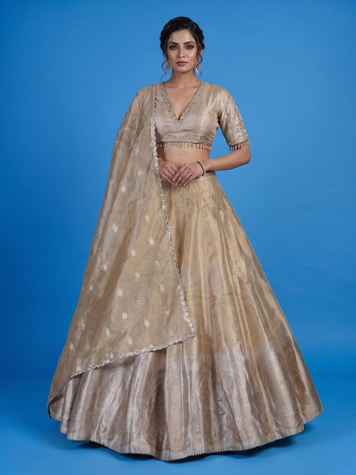 Golden silk lehenga choli with zardosi gota and zari embellishments