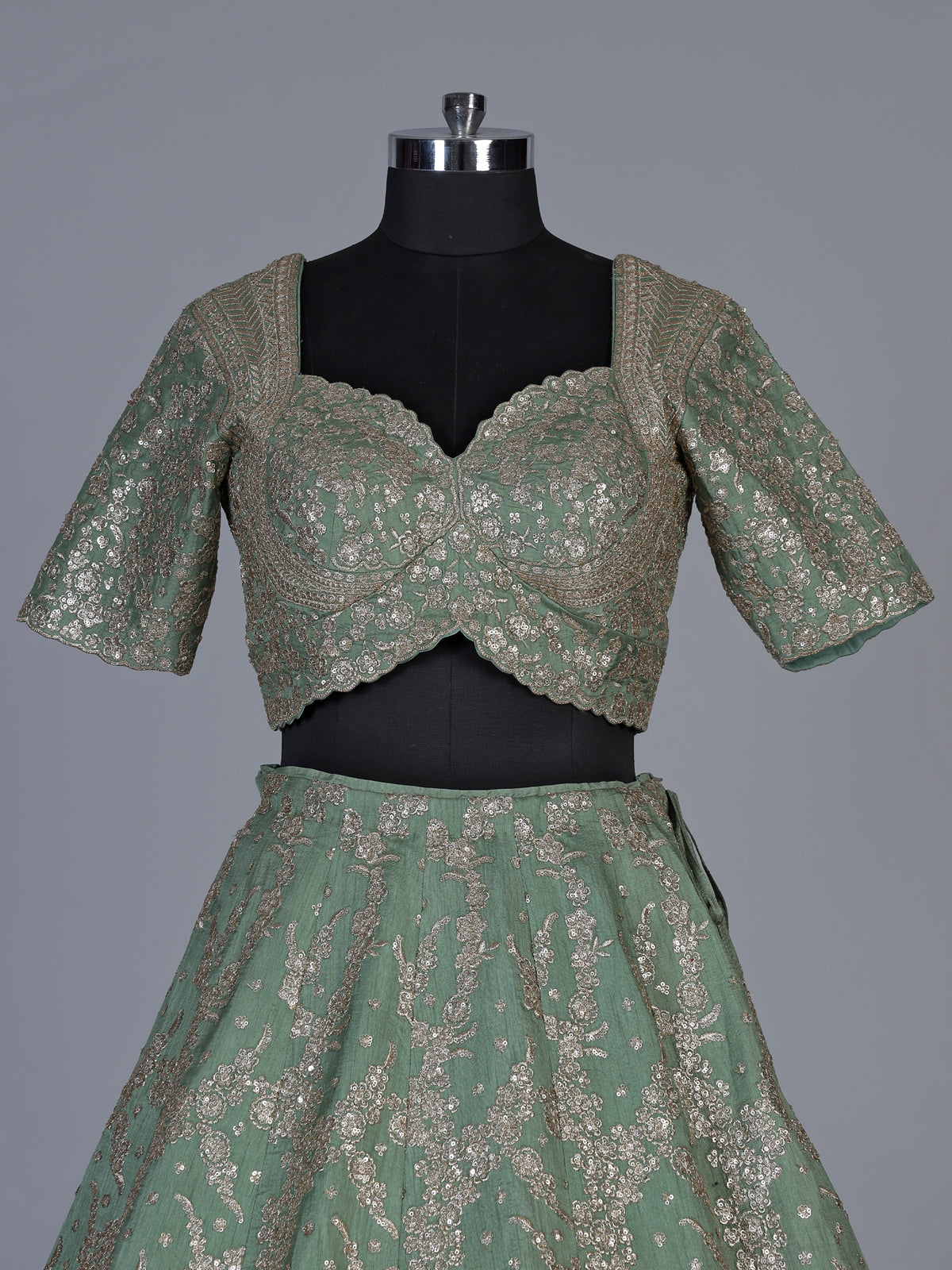 Pista green silk lehenga choli with resham floral embellishments