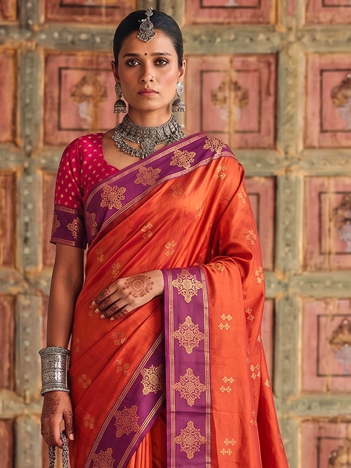 Radiant orange designer silk saree women