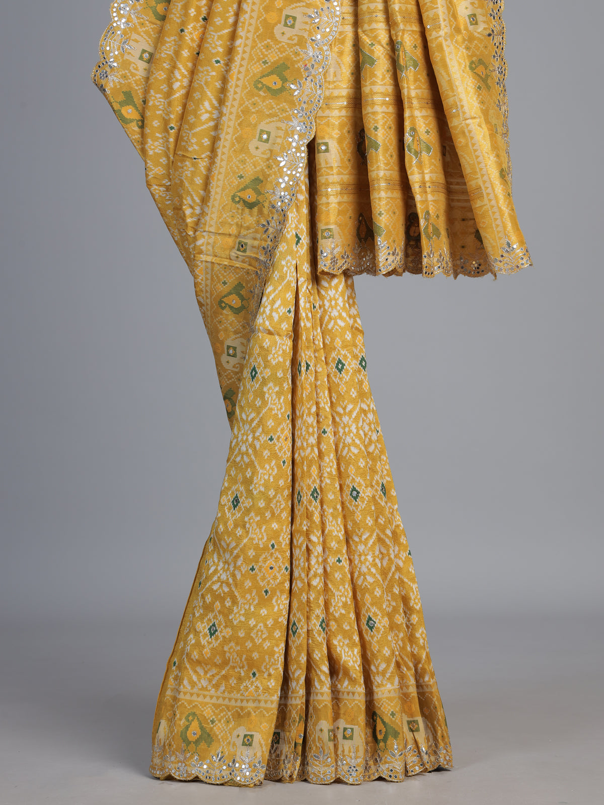 Mustard yellow soft silk saree with vibrant patola printed elegance