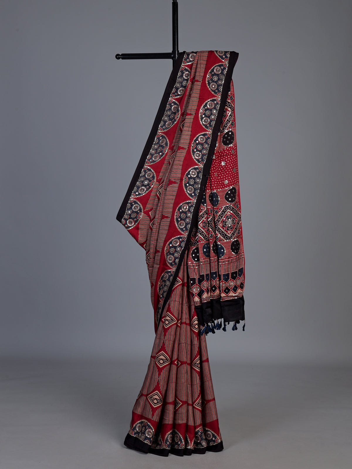 Maroon crepe silk saree with elegant sequin printed artistry