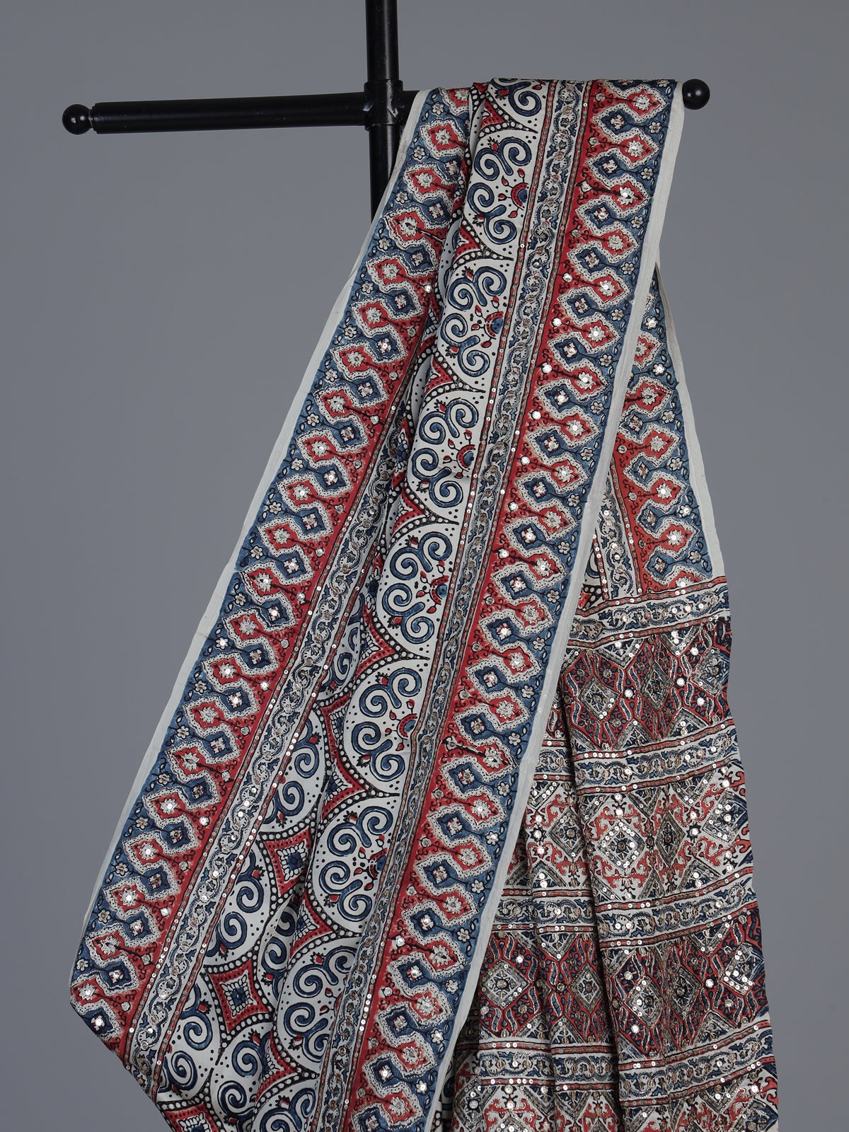 White crepe silk saree with delicate printed festive charm