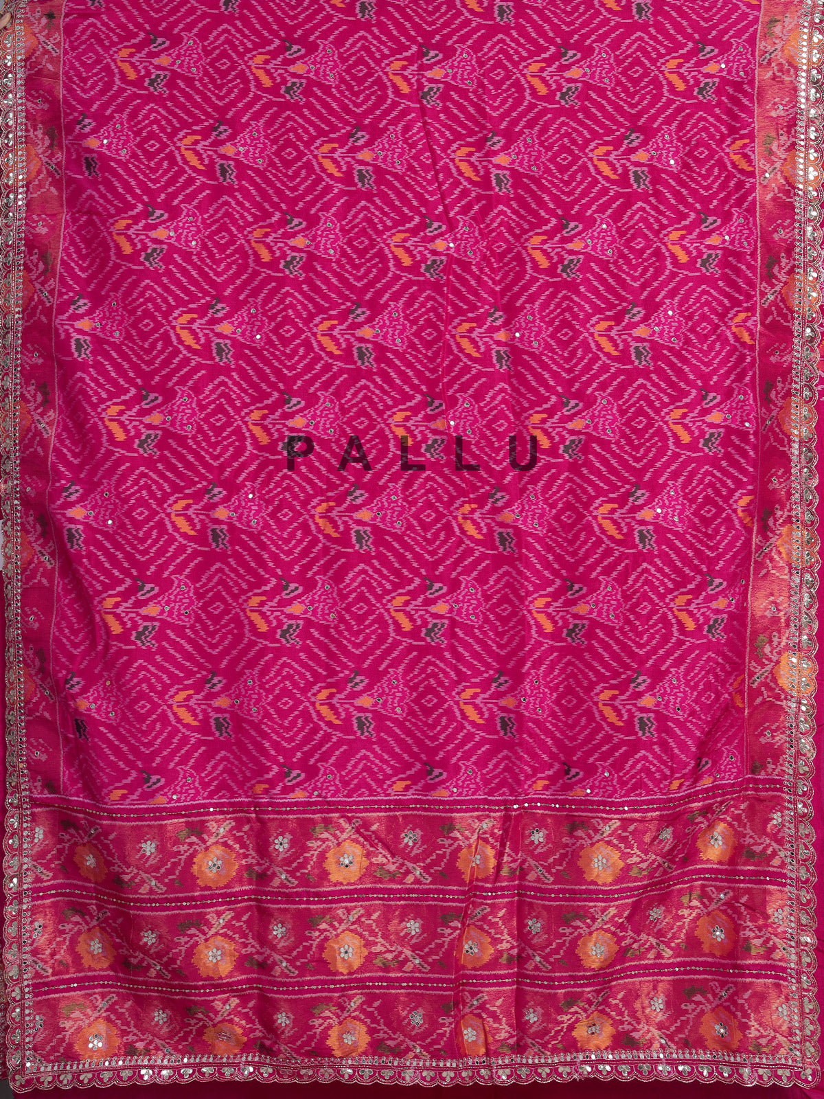 Rani pink soft silk saree with bandhani floral contrast detailing