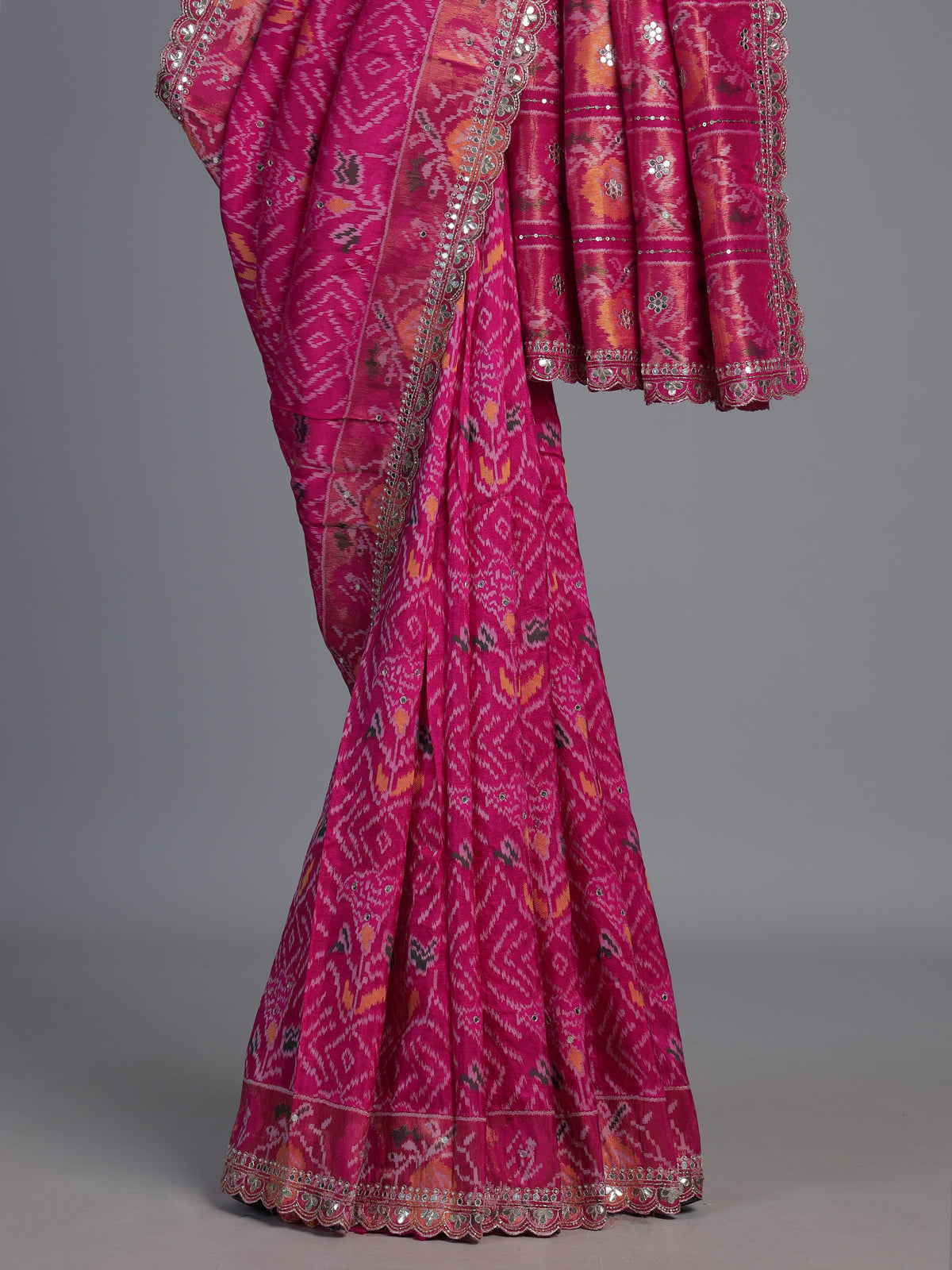 Rani pink soft silk saree with bandhani floral contrast detailing