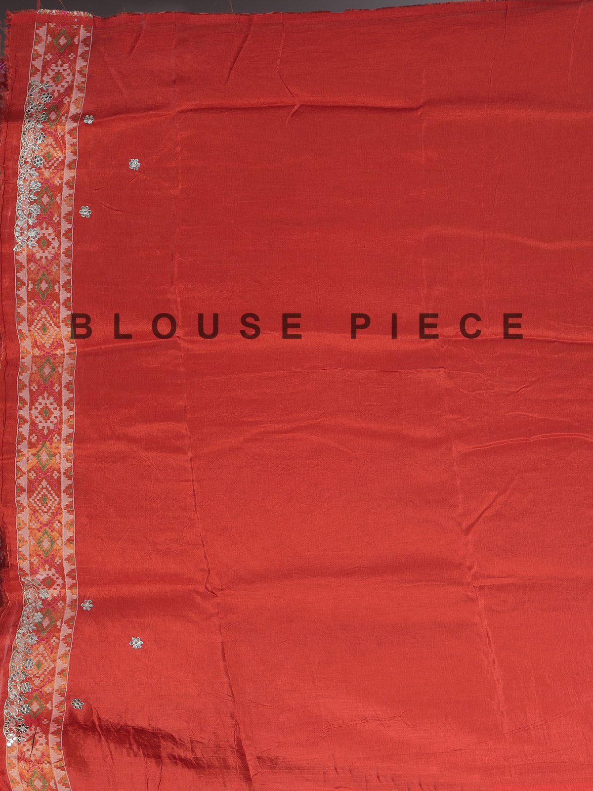 Rust orange soft silk saree with graceful ikat printed detailing