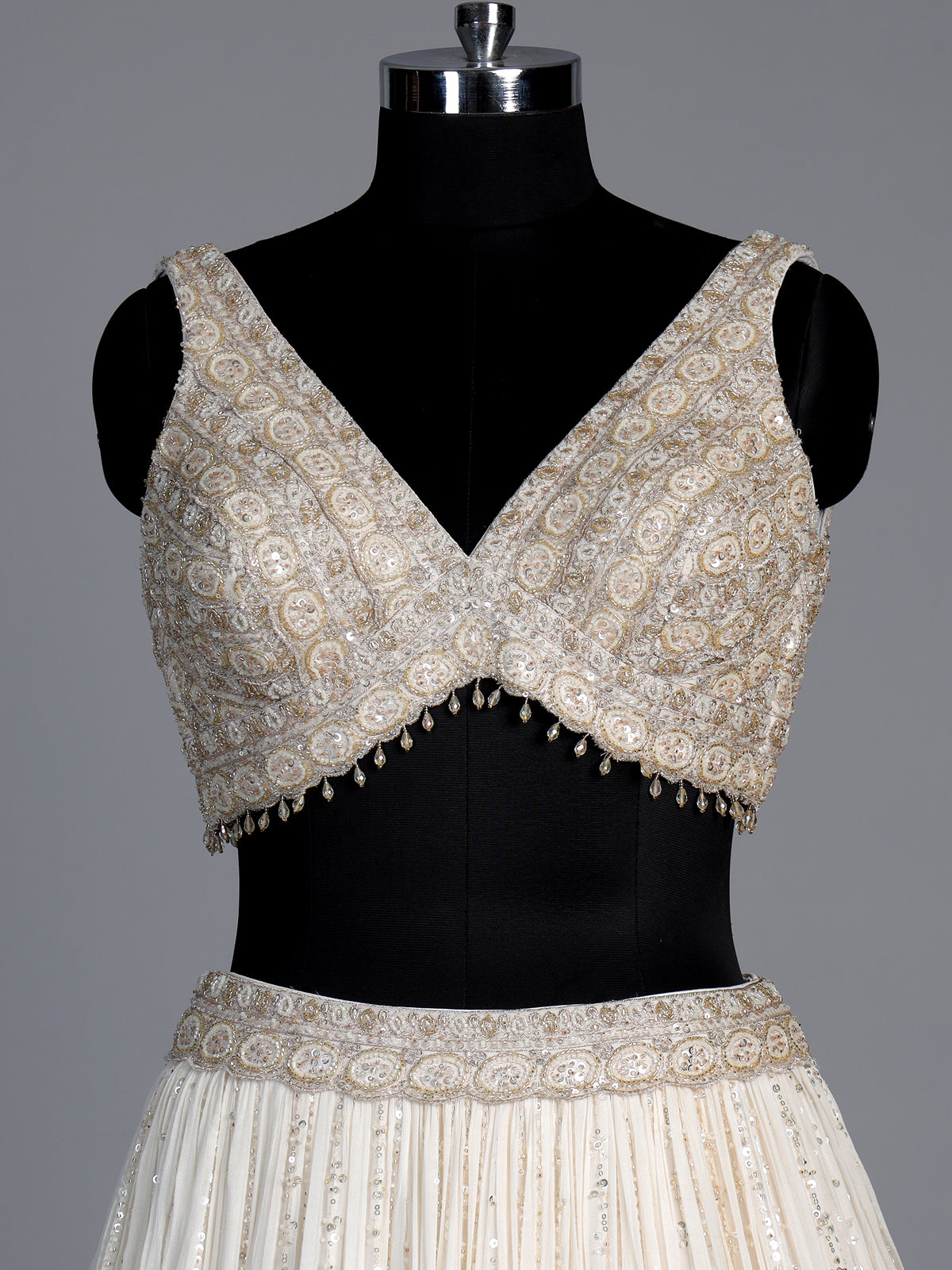 Cream georgette resham embellished lehenga choli with dupatta